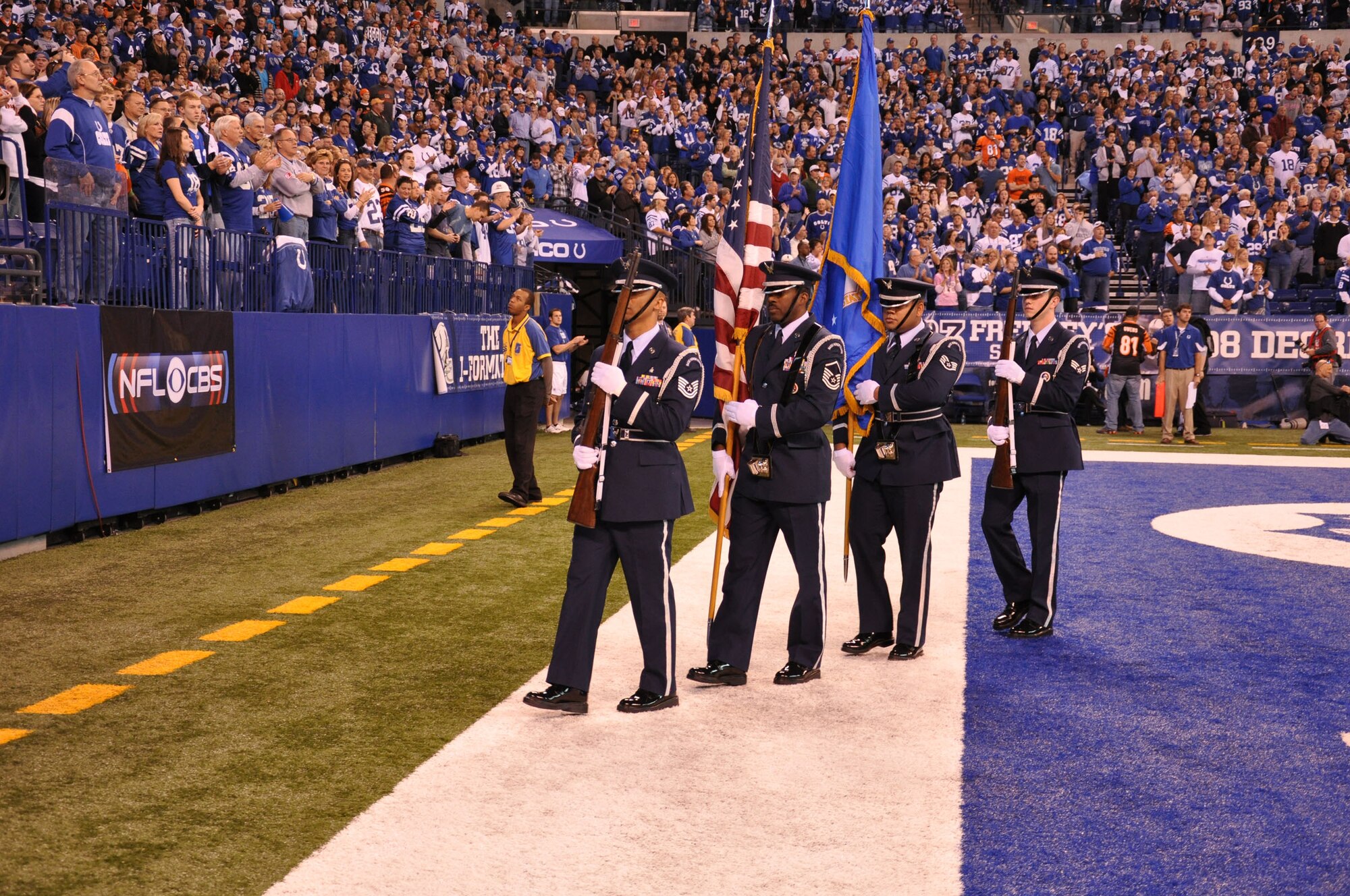 WRIGHT-PATTERSON AIR FORCE BASE, Ohio – The Wright-Patterson Air Force Base Honor Guard performs during the pre-game activities Nov. 14 at the Cincinnati Bengals versus Indianapolis Colts football game in Indianapolis, Ind.  Reservists from the 445th Airlift Wing also participated on the field by holding a large flag during the National Anthem as part of the pre-game activities. (U.S. Air Force photo/Capt. Rod McNany)