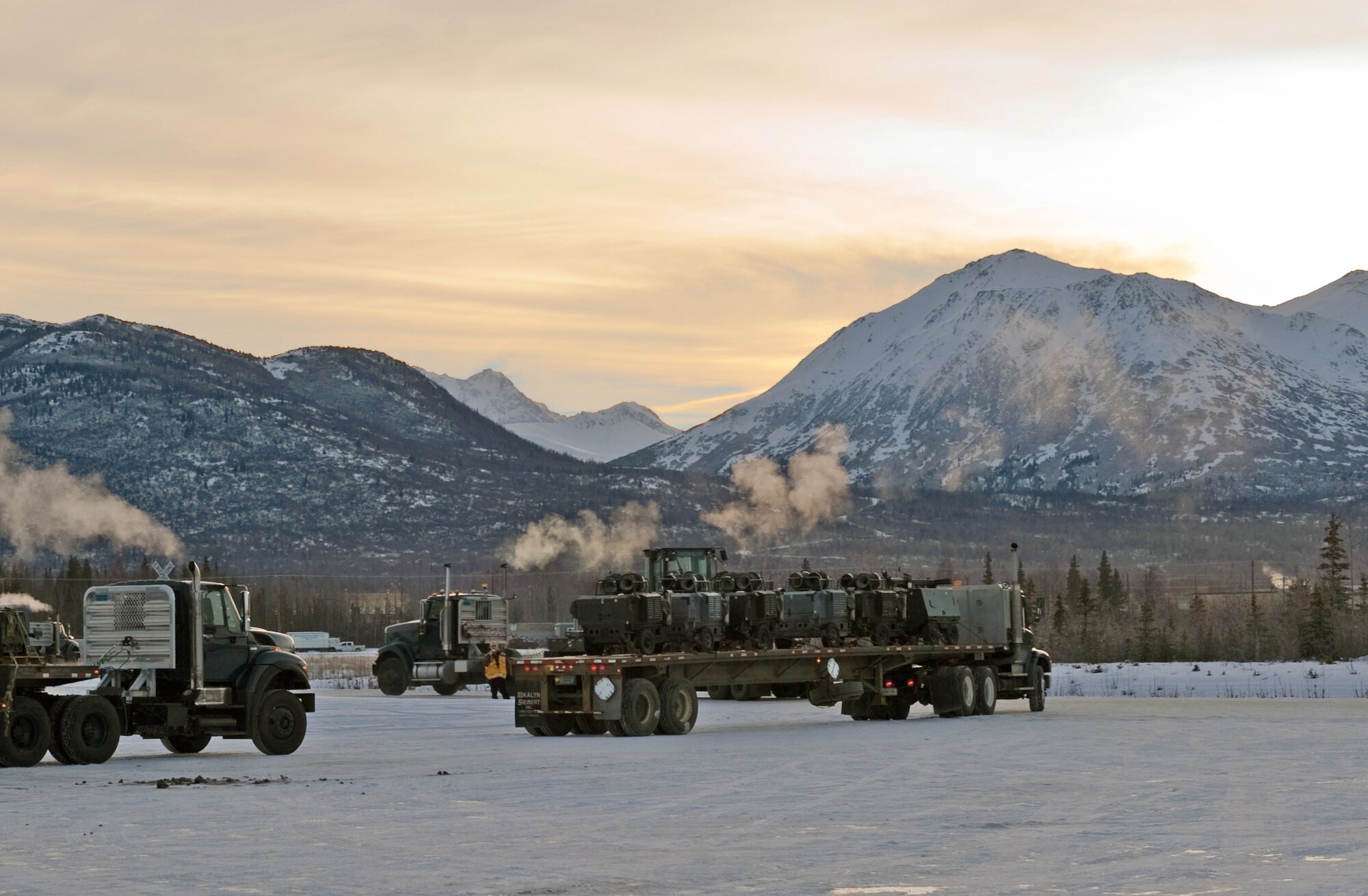 Members of the Army, Air Force, Alaska National Guard along with several other state assets, delivered materials Nov. 18, 2010, at Joint Base Elmendorf-Richardson, Alaska. The effort was in support of the rescue mission for a JB Elmendorf F-22 Raptor pilot. The crash site is approximately 100 miles north of Anchorage. (U.S. Air Force photo)

