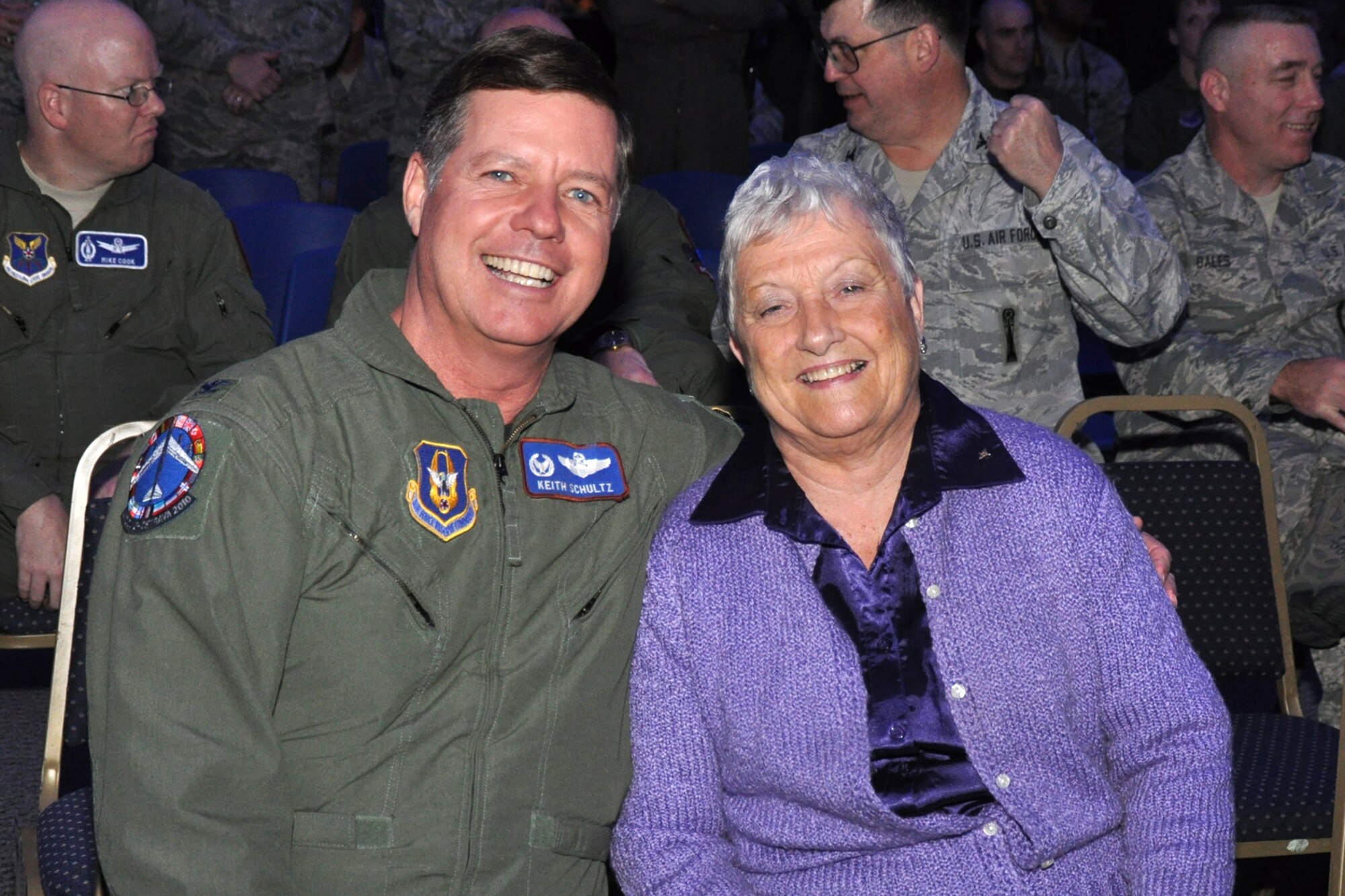 Helen Black, a long-time supporter and friend of the 917th Wing, joins Col. Keith Schultz, 917th Operations Group, commander, in supporting 917th Wing Airmen during the first night of score posting for the first-ever Global  Strike Challenge in Hoban Hall at Barksdale Air Force Base, La., Nov. 16, 2010. More than 400 Airmen from many bases joined in the competition that began in April. The competition wraps up November 17, with the awarding of trophies to the final winners. (U.S. Air Force photo/Tech. Sgt. Jeff Walston)

