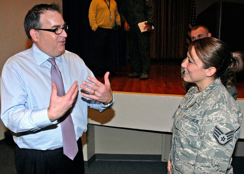 Tom Farley, guest speaker at the Holiday Traffic Safety Campaign held at the enlisted hall Nov. 18, shares his unconventional safety insights with Staff Sgt. Alicia Mangan, 96th Medical Operations Squadron.  (U.S. Air Force photo/Kevin Gaddie)
