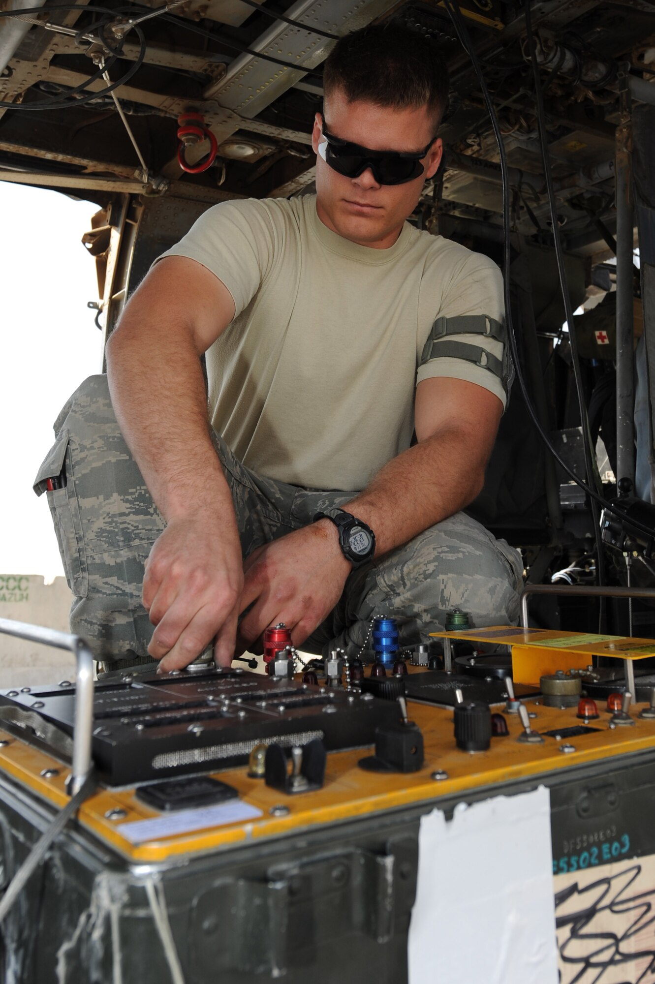Senior Airman John Rhoads performs a self-check on a pitot static test set on an HH-60G Pave Hawk helicopter Nov. 17, 2010, at Kandahar Airfield, Afghanistan. Airman Rhoads, from Boise, Idaho, is an electronic warfare journeyman assigned to the 451st Expeditionary Aircraft Maintenance Squadron, 55th Expeditionary Helicopter Maintenance Unit. (U.S. Air Force photo by Tech. Sgt. Chad Chisholm/Released)