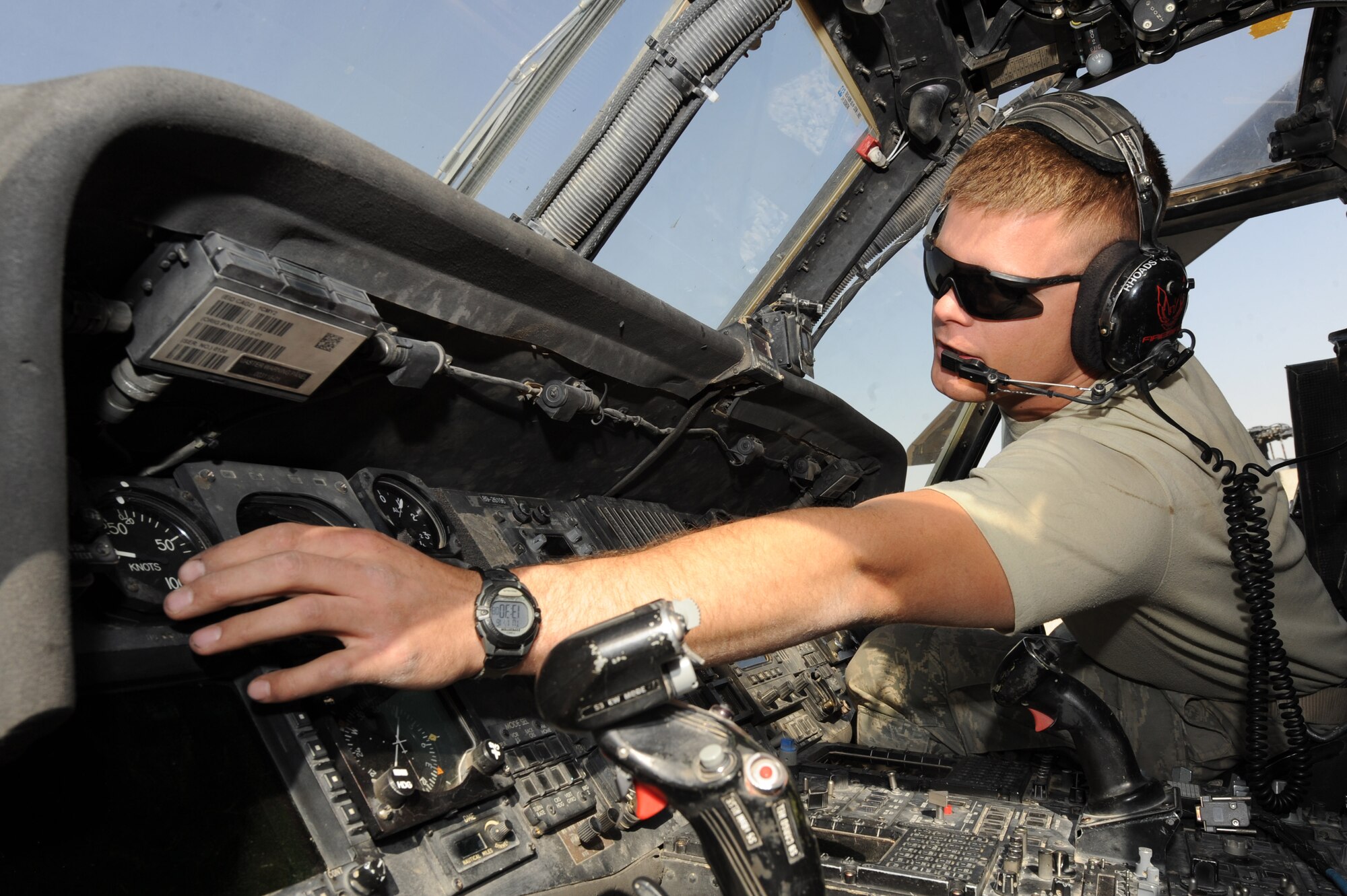 Senior Airman John Rhoads checks for the proper operation of an HH-60G Pave Hawk helicopter barometric altimeter Nov. 17, 2010, at Kandahar Airfield, Afghanistan.  Airman Rhoads, from Boise, Idaho, is an electronic warfare journeyman assigned to the 451st Expeditionary Aircraft Maintenance Squadron, 55th Expeditionary Helicopter Maintenance Unit. (U.S. Air Force photo by Tech. Sgt. Chad Chisholm/Released)