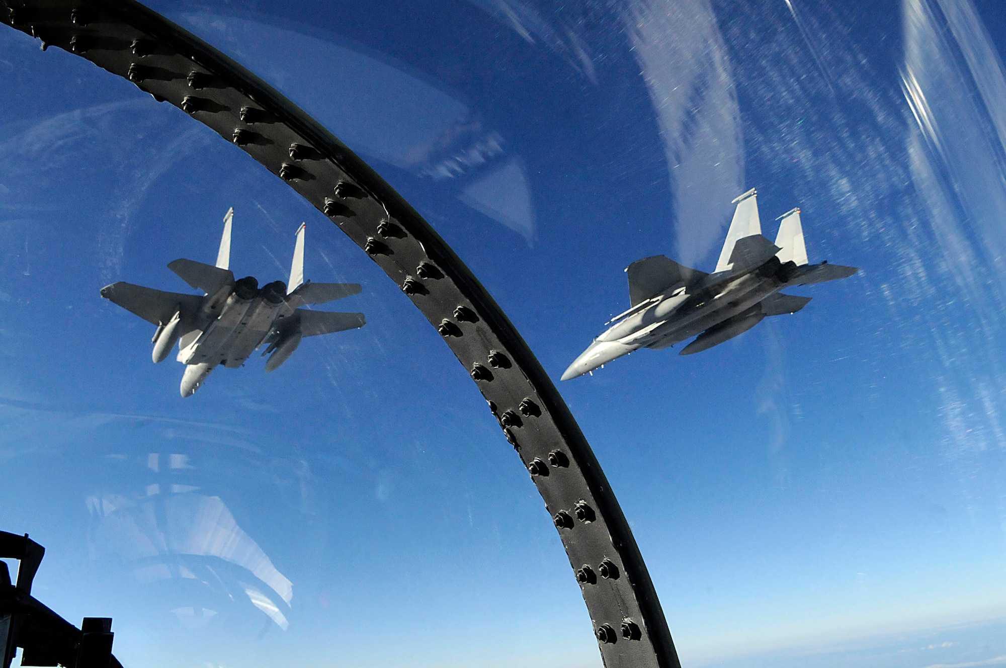 Three F-15 Eagles from the 44th Fighter Squadron train with Japan Air Self Defense Forces Nov. 17, 2010, off the coast of Hokkaido, Japan. Twelve jets and nearly 200 Airmen from Kadena Air Base, Japan, partcipated in an Aviation Training Relocation. (U.S. Air Force photo/Tech. Sgt. Mike Tateishi) 
