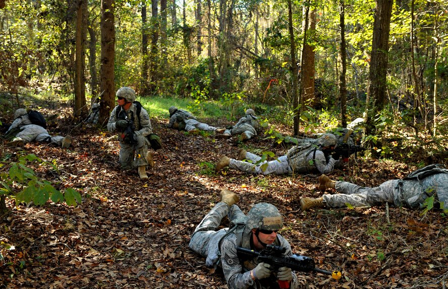 MOODY AIR FORCE BASE, Ga. -- A patrol team groups in a 360-degree formation leaving no blind spots Nov. 17. The team will practice these formations and others in preparation for a Phase II Operational Readiness Inspection later next year. (U.S. Air Force photo/Airman 1st Class Nicholas Benroth)(RELEASED)