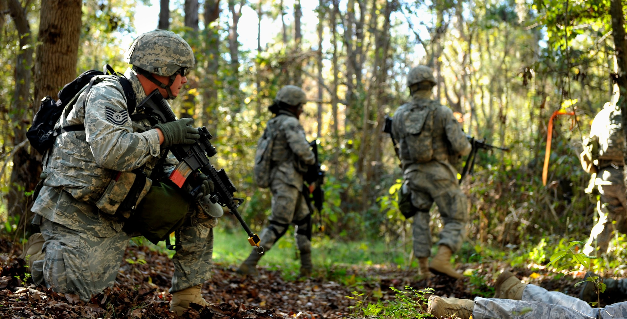 MOODY AIR FORCE BASE, Ga. -- Tech Sgt. Clinton Ellis, 23rd Security Forces Squadron NCO in charge of training, prepares to move the patrol out after forming up to secure the area Nov. 17. The patrol is a critical part of a Phase II Operational Readiness Inspection for the 23rd SFS. (U.S. Air Force photo/Airman 1st Class Nicholas Benroth)(RELEASED)
