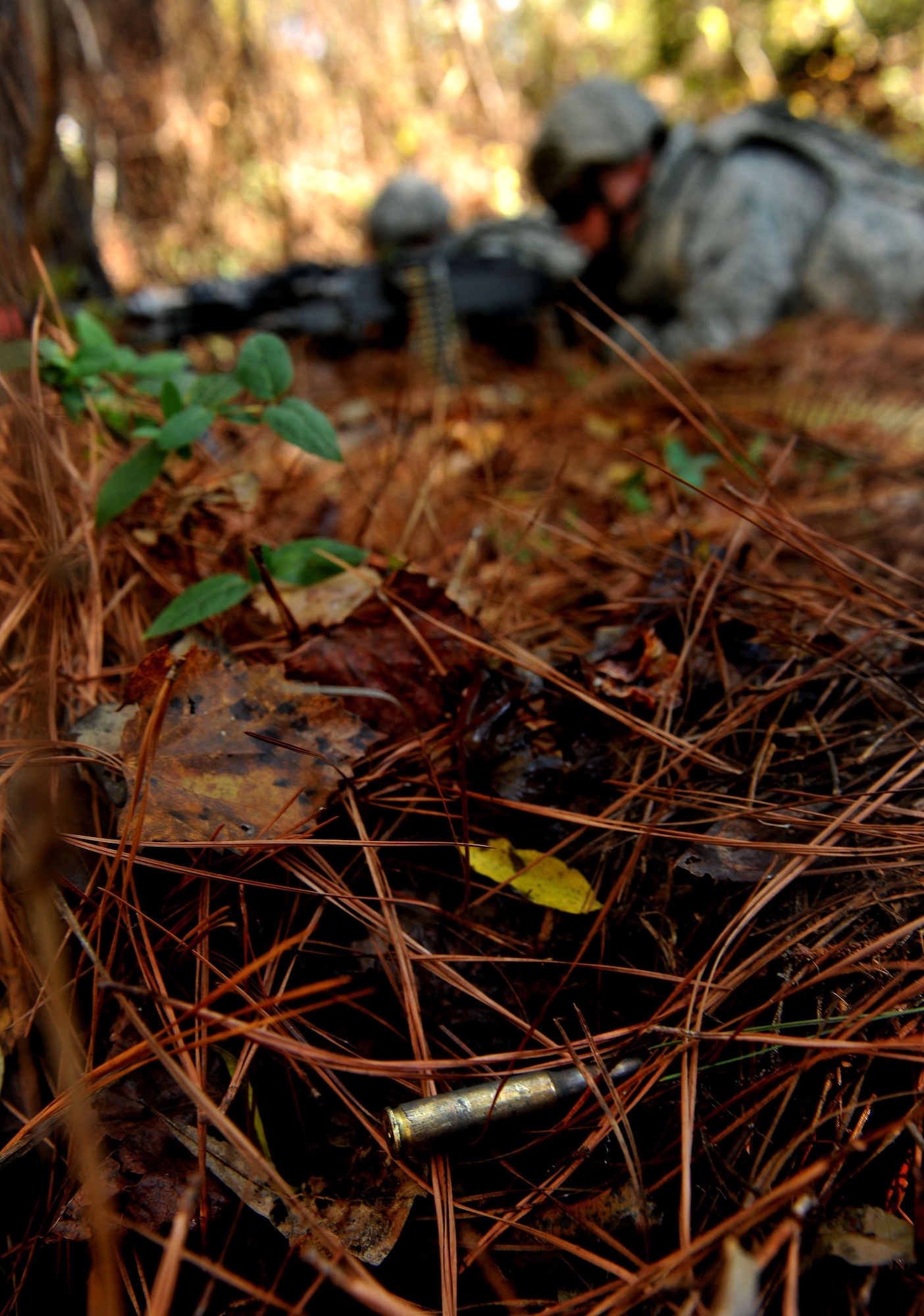 MOODY AIR FORCE BASE, Ga. -- After a fire fight between the 23rd Security Forces Squadron and opposing forces, a bullet shell from a M240B machine gun lays on the ground during a Phase II Operational Readiness Exercise Nov. 17. The scenario for the 23rd SFS members was to patrol an area where suspicious activity was reported and engage the opposing forces. (U.S. Air Force photo/Airman 1st Class Joshua Green)(RELEASED)  
