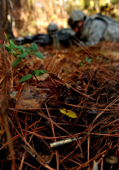 MOODY AIR FORCE BASE, Ga. -- After a fire fight between the 23rd Security Forces Squadron and opposing forces, a bullet shell from a M240B machine gun lays on the ground during a Phase II Operational Readiness Exercise Nov. 17. The scenario for the 23rd SFS members was to patrol an area where suspicious activity was reported and engage the opposing forces. (U.S. Air Force photo/Airman 1st Class Joshua Green)(RELEASED)  
