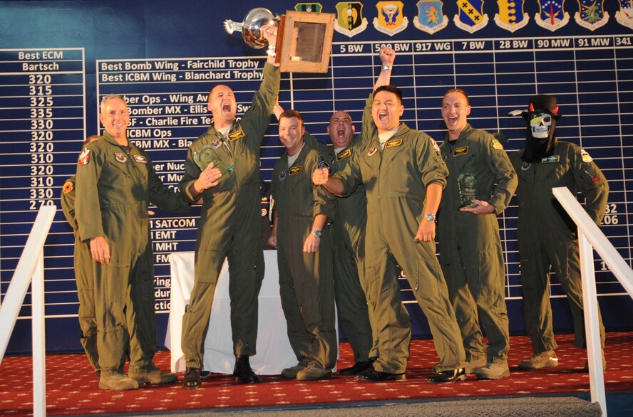 Maj. Gen. Floyd Carpenter, Eighth Air Force commander, presents the Linebacker Trophy for Best B-52 Operations Squadron to the 2nd Operations Support Squadron from Barksdale Air Force Base, La., Nov. 16 at the first night of the score posting of the Global Strike Challenge. Continuing the tradition established in 1974, the Linebacker Trophy is named in honor of those crews who participated in the Linebacker missions over North Vietnam between May and December 1972. (U.S. Air Force photo/Senior Airman Alexandra M. Boutte)