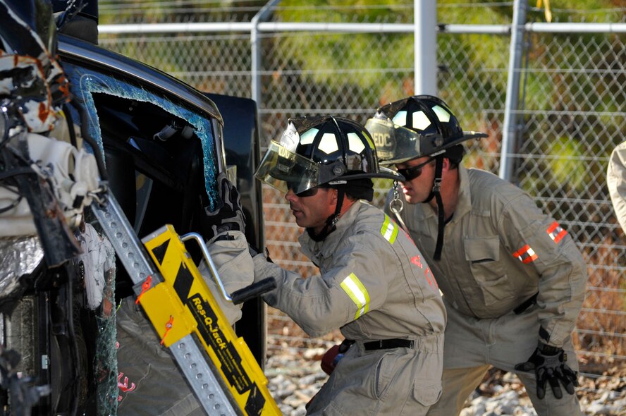 AEDC firefighters use a variety of their extrication tools during training Nov. 9 at LKQ Salvage in Manchester.