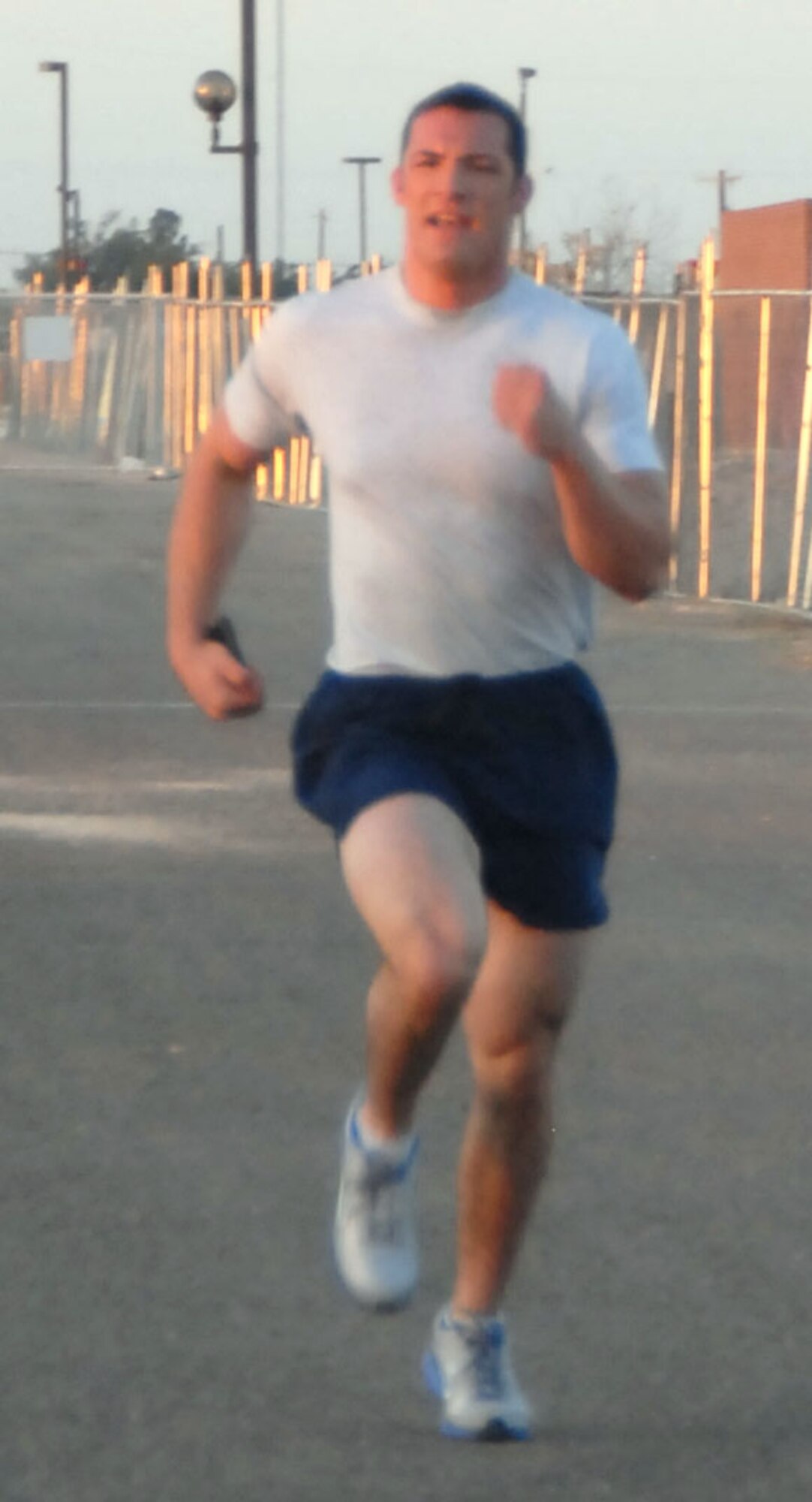 GOODFELLOW AIR FORCE BASE, Texas-- Airman 1st Class Duayne Martinez, 17th Contracting Squadron, takes a strong first place finish during the annual Turkey Trot Fun Run/Walk at the triangle here Nov. 10. Airman Martinez finished the two-mile run in just over 15 minutes. (U.S. Air Force photo/Airman 1st Class Jessica D. Keith)