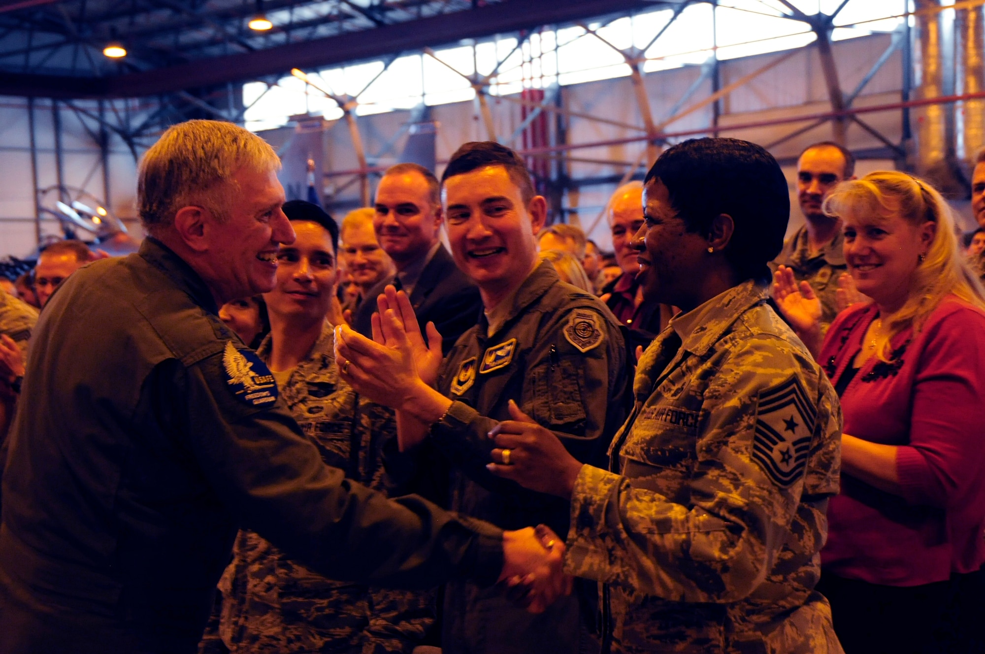 ROYAL AIR FORCE LAKENHEATH, England – Gen. Roger A. Brady, U.S. Air Forces in Europe commander, congratulates Chief Master Sgt. SaRita Lathan, 48th Fighter Wing command chief, on the wing receiving an outstanding rating on its operational readiness inspection on Nov. 5. The Liberty Wing received the first U.S. Air Forces in Europe operational readiness inspection outstanding rating since 1986.   (U.S. Air Force photo/Airman 1st Class Eboni Reams)