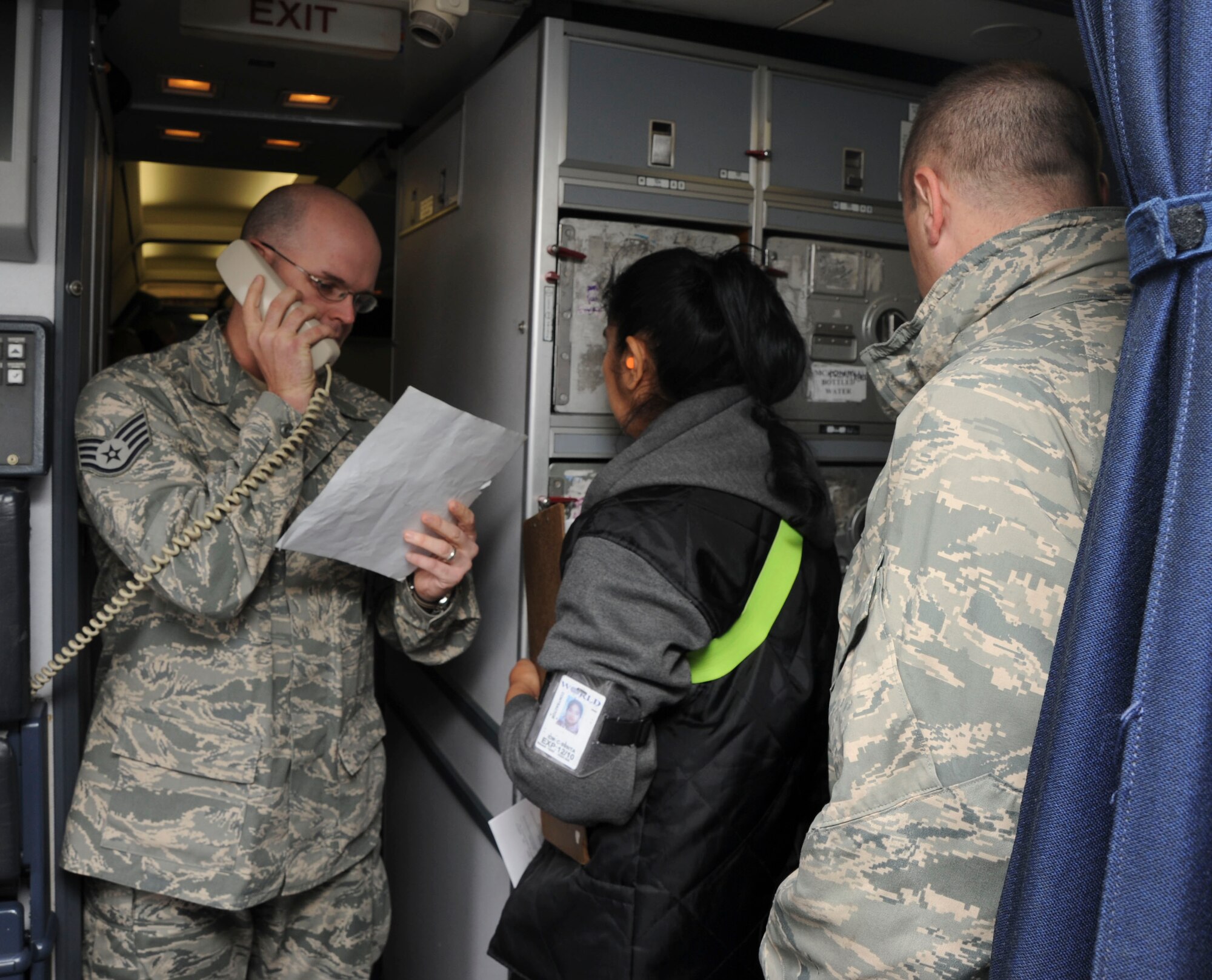 U.S. Air Force Staff Sgt Ross List, 35th Security Forces Squadron NCO in charge of customs and confinement, explains to passengers on the Patriot Express the rules and regulations of entering the country at Misawa Air Base, Japan, Nov. 15, 2010. An average of 68 planes a month arrive at Misawa AB, with more than 1,000 passengers in-and out-bound of the country. (U.S. Air Force photo by Tech. Sgt. Russell McBride/Released)