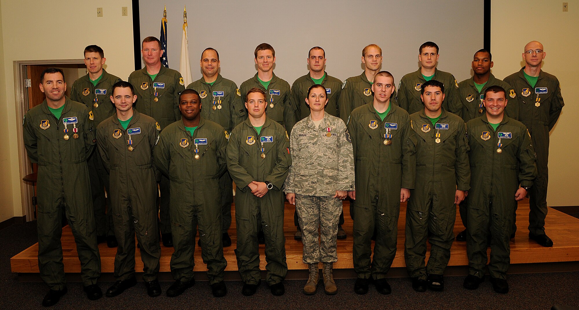 Brig. Gen. Ken Wilsbach, 18th Wing commander, presented 33rd Rescue Squadron personnel with medals earned during recent deployments to Operation Enduring Freedom during an award presentation at Kadena Air Base Nov. 19. Thirty-one medals were awarded during the ceremony including 25 Air Medals, two Meritorious Service Medals, three Air Force Commendation Medals and one Air Force Combat Action Medal. (U.S. Air Force photo/Airman 1st Class Jarvie Wallace)