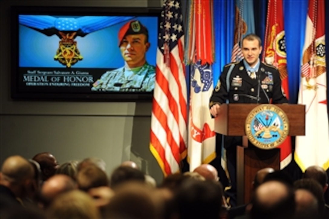 Medal of Honor recipient Army Staff Sgt. Salvatore Giunta thanks his teammates from the 1st Squad, 1st Platoon, Battle Company, 2nd Battalion (Airborne), 503rd Infantry Regiment during his induction ceremony into the Hall of Heroes in the Pentagon on Nov. 17, 2010.  Giunta, the first living Medal of Honor recipient since the Vietnam War, received the nation's highest military honor for his actions of valor during an enemy attack in the Korengal Valley of Afghanistan in October 2007 when he risked his life to save the lives of his fellow soldiers.  