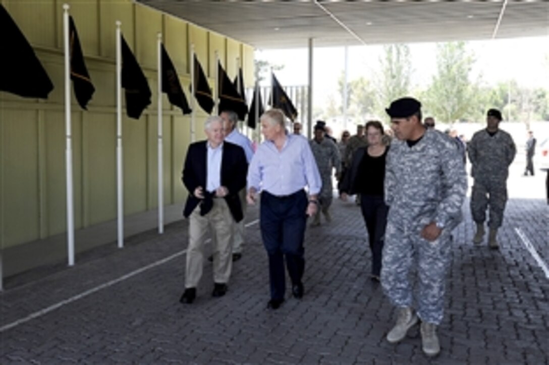 U.S. Defense Secretary Robert M. Gates, left, and Chilean Defense Minister Jaime Ravinet tour the Fuerte Lautaro, Chilean Special Forces, in Colina, Chile, Nov. 20, 2010. 