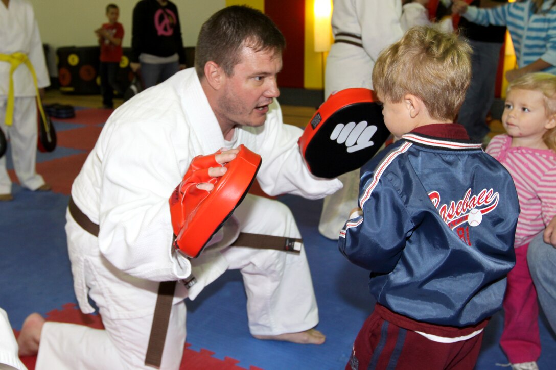 Dayton E. Bilenski, son of a Camp Pendleton Marine, throws punches during a Samurai Expo held for the Camp Pendleton Exceptional Family Member Program at the Abby Reinke Community Center, Nov. 20. The expo featured a book reading by Robert Gould, the founder and creator of “Time Soldiers” adventure books, and a martial-arts demonstration by special guest Sensei Richard Rabago, who has appeared in movies such as “Power Ranger/VR Trooper,” “Full Impact” and “Blood Fist IV.”