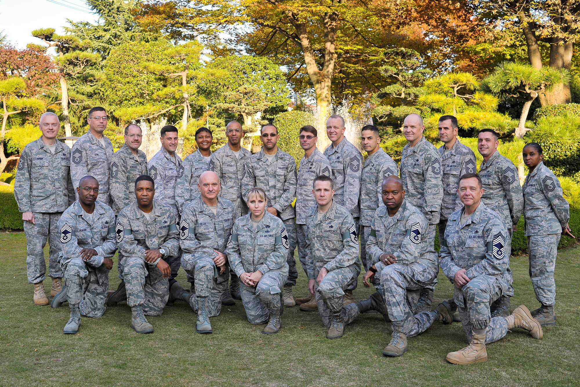 YOKOTA AIR BASE, Japan -- The Team Yokota Chief's Group and the newest chief selects gather for a group photo outside of the Enlisted Club.  Seven senior master sergeants assigned to Yokota Air Base were among the 504 selected Air Force wide for promotion to chief master sergeant, personnel officials announced Thursday morning, Nov. 18. (U.S. Air Force photo/Osakabe Yasuo)