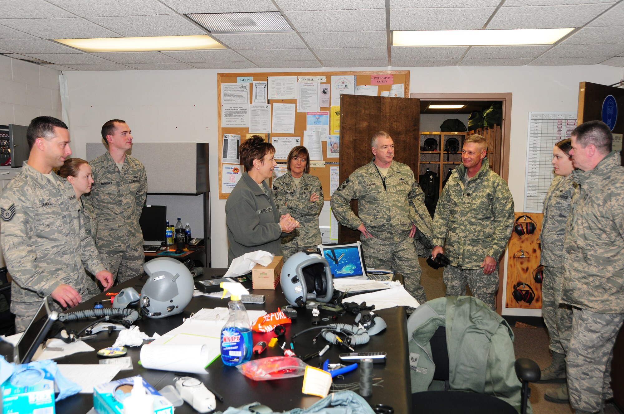 National Guard Bureau Command Chief Master Sgt. Denise Jelinski-Hall talks with members of the Life Support shop after arriving at the 148th Fighter Wing on Nov. 20, 2010 in Duluth, Minn.  Chief Master Sgt Denise Jelinski Hall came to the 148th FW to host an Airmens Call where she covered subjects such as suicide prevention and the importance family, friends and civilian employers have to the Naional Guard mission.  (U.S. Air Force photo by Staff Sgt. Donald Acton)