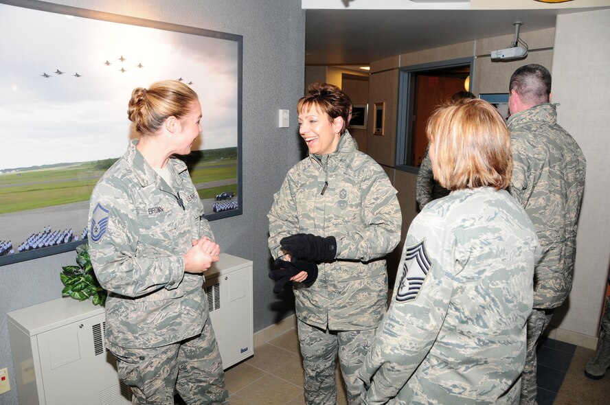 National Guard Bureau Command Chief Master Sgt. Denise Jelinski-Hall shares a laugh during a discussion with Master Sgt. Jennifer Brown and Chief Master Sgt. Marcia Dumancas after arriving at the 148th Fighter Wing on Nov. 20, 2010 in Duluth, Minn.  Chief Master Sgt. Denise Jelinski Hall came to the 148th FW to host an Airmens Call where she covered subjects such as suicide prevention and the importance family, friends and civilian employers have to the Naional Guard mission.  (U.S. Air Force photo by Staff Sgt. Donald Acton)