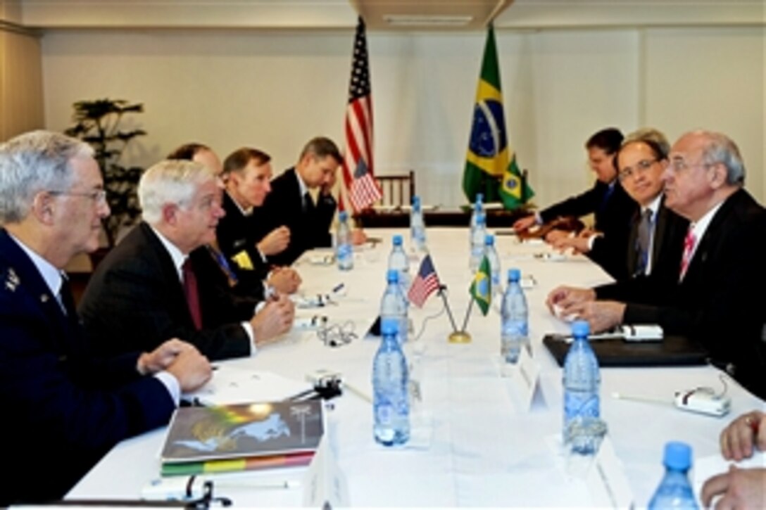 U.S. Defense Secretary Robert M. Gates and Brazilian Defense Minister Nelson Jobim hold a bilateral meeting in Santa Cruz, Bolivia, Nov. 21, 2010. Gates and Jobim are in Bolivia to attend a conference of Western Hemisphere defense ministers.