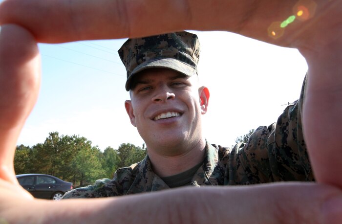 Lance Cpl. Charles Taylor, a ground radio repairman with 2nd Maintenance Battalion, Combat Logistics Regiment 25, 2nd Marine Logistics Group, poises for a photo aboard Camp Lejeune, N.C., Nov. 22, 2010. The Hazel Park, Mich., native has been in the Marine Corps for over a year. (U.S. Marine Corps photo by Pfc. Franklin E. Mercado)