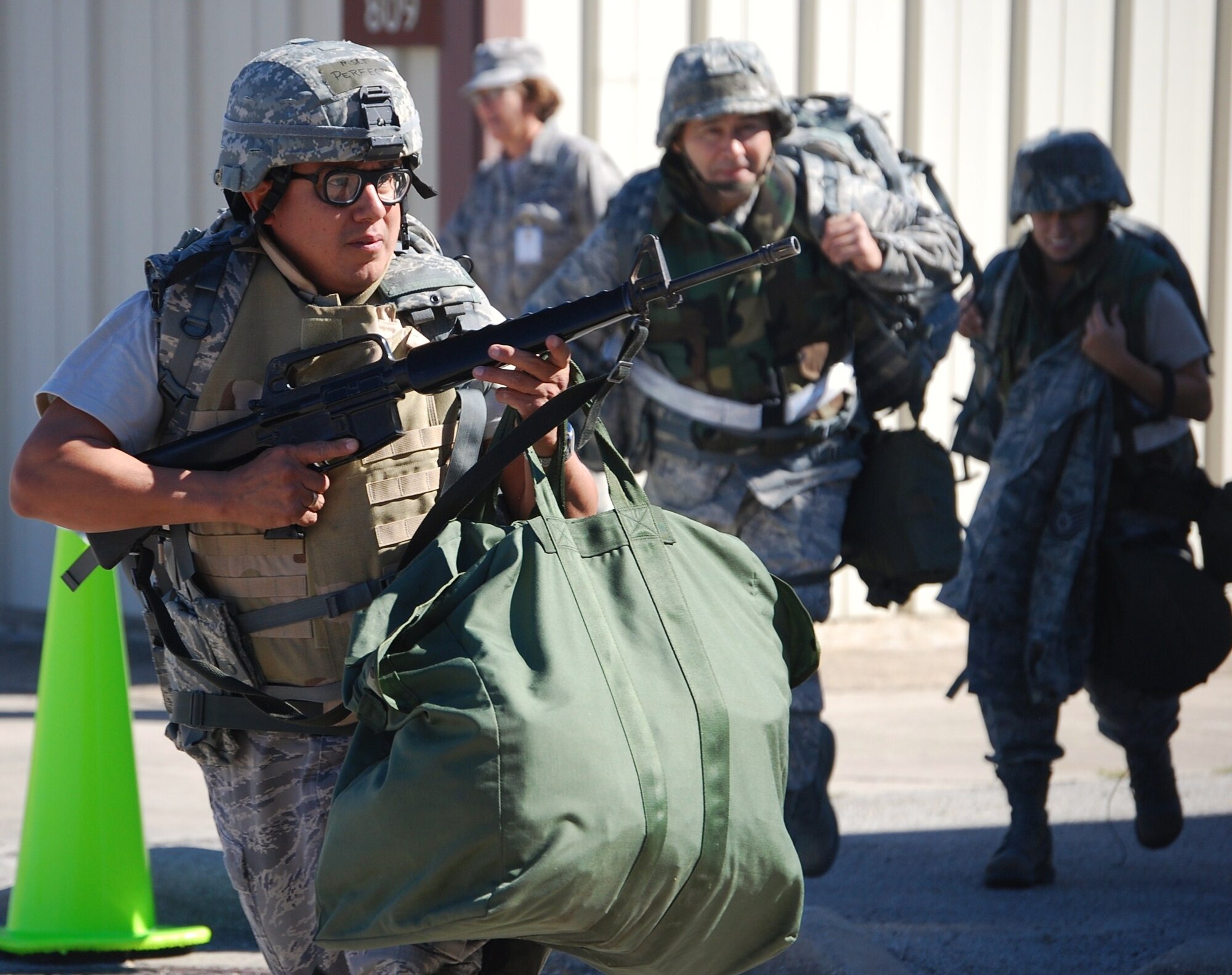 Alamo Wing members practiced their warfighting skills at the recent ORE. Moving to shelter during a simulated attack is a crucial survival skill during a deployment. (U.S. Air Force Photo/Tech. Sgt. Carlos Trevino)
