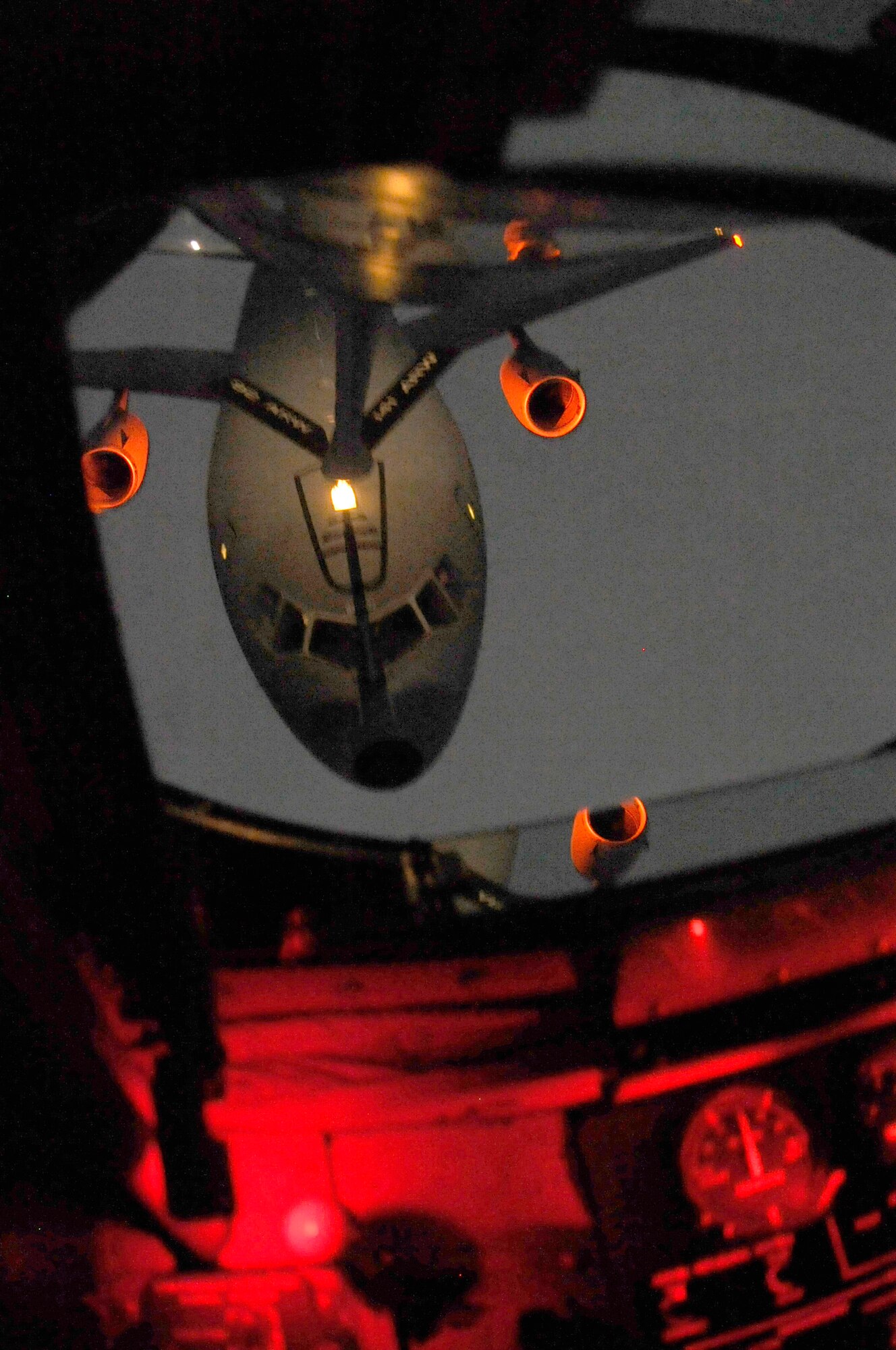 A KC-10 Extender from Travis Air Force Base, Calif., receives fuel from a Fairchild KC-135 Stratotanker Nov. 18, 2010 over the Pacific Northwest. The KC-135 is from is from the 92nd Air Refueling Wing. (U.S. Air Force photo/ Airman 1st Class Natasha E. Stannard)