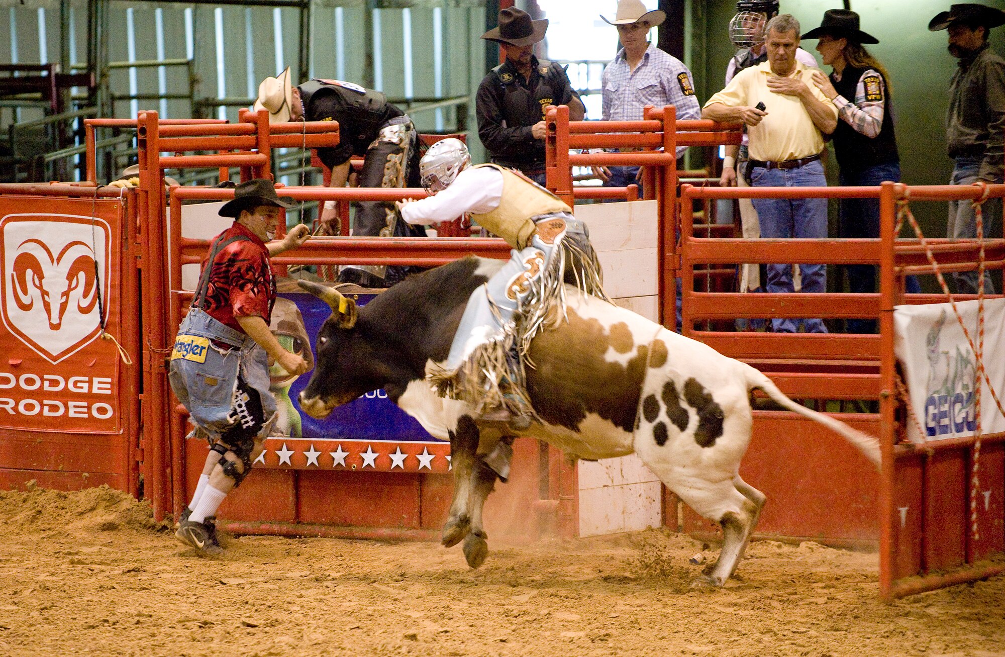 Staff Sgt. R.J. Eppers leaves the chute during the bull riding competition at the Professional Armed Forces Rodeo Associations World Finals Nov. 20, 2010, in Glen Rose, Texas. PAFRA is a professional rodeo organization founded and comprised of military members, retirees, dependents, veterans and civilian Department of Defense card holders. Sergeant Eppers is assigned to Ellsworth Air Force Base, S.D. (U.S. Air Force photo/Master Sgt. Jack Braden)