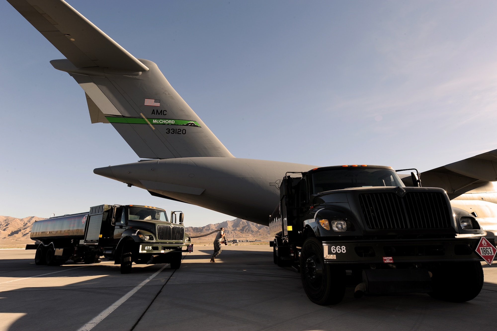 NELLIS AIR FORCE BASE, Nev. --  Staff Sgt. James Stephens, a fuels distribution specialist with the 99th Logistics Readiness Squadron, prepares to fuel a C-17 Globemaster III during a Mobility Air Forces Exercise Nov 17. More than 40 C-17 Globemaster III and C-130 Hercules cargo aircraft assembled in aerial formations over the Nevada Test and Training Range to conduct air and ground operations as part of the bi-annual U.S. Air Force Weapons School MAFEX. (U.S. Air Force photo by Senior Airman Brett Clashman)