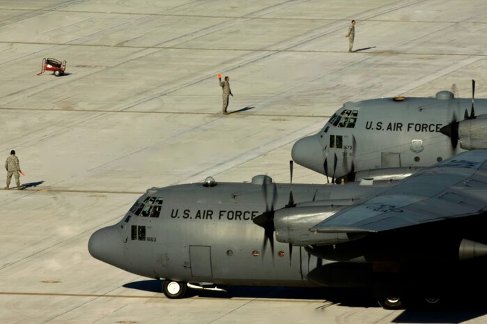 NELLIS AIR FORCE BASE, Nev. -- C-130 Hercules aircraft taxis around during the Mobility Air Forces Exercise held at Nellis and over the Nevada Test and Training Range,  Nov 17. Approximately 40 C-17 Globemaster III and C-130 Hercules cargo aircraft will assemble in aerial formations over the NTTR to conduct air and ground operations as part of the bi-annual, U.S. Air Force Weapons School Mobility Air Forces Exercise.  (U.S. Air Force photo by Airman 1st Class Jamie Nicley) (Released)