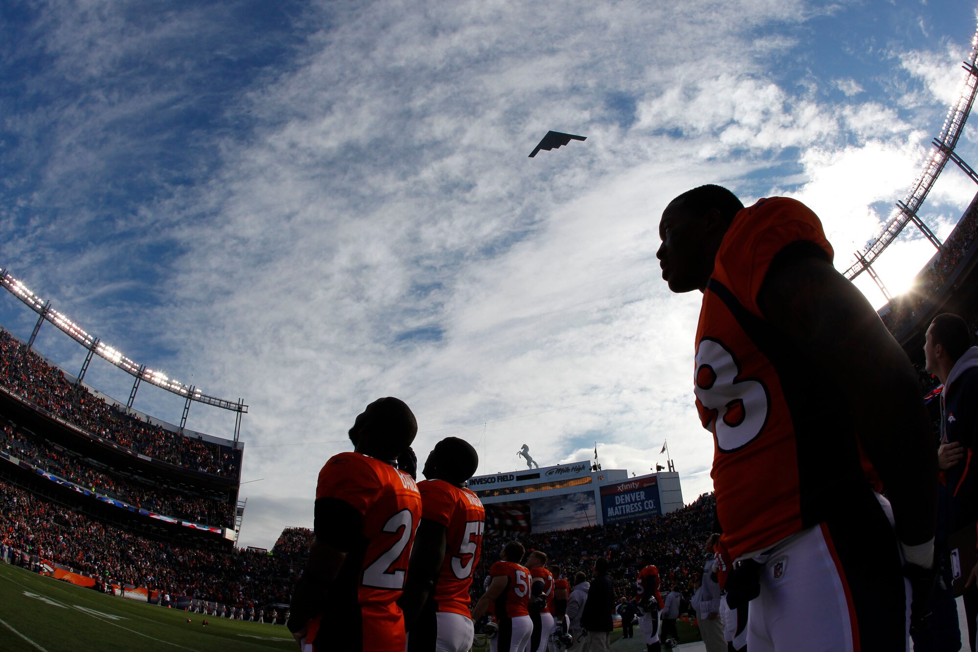 A B-2 Stealth bomber from Whiteman Air Force Base, Mo., does a flyover during pre-game activities for the Denver Broncos - Kansas City Chiefs game Nov. 14 in Denver. (Photo courtesy of Eric Baake)