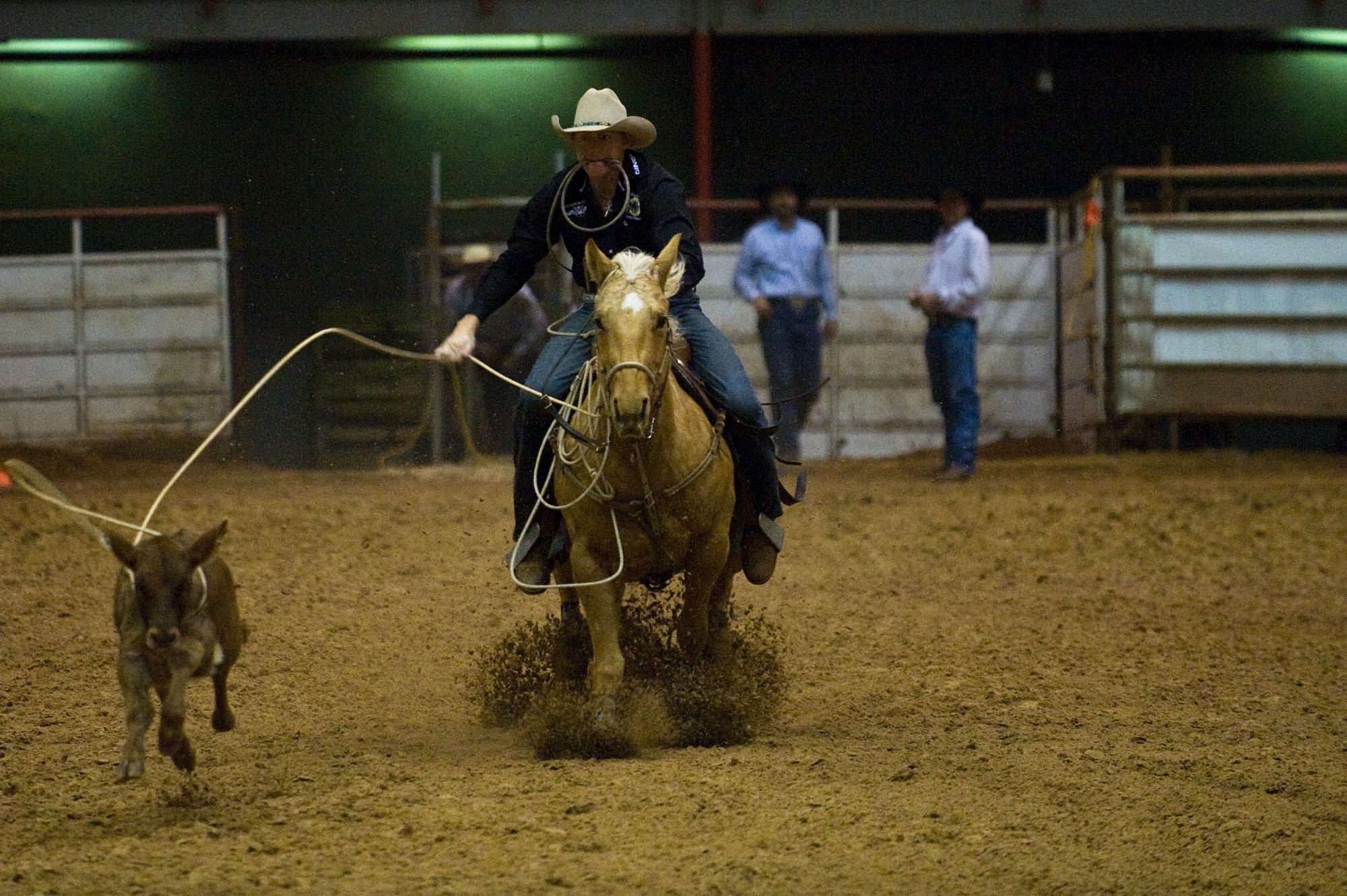 Master Sgt. Travis Beck competes in calf roping at the Professional Armed Forces Rodeo Associations World Finals Nov. 20, 2010, in Glen Rose, Texas. Sergeant Beck earned first place in the Men's All-Around taking top honors of the rodeo and third place in the calf roping event. (U.S. Air Force photo/Tech. Sgt. Bennie J. Davis III)