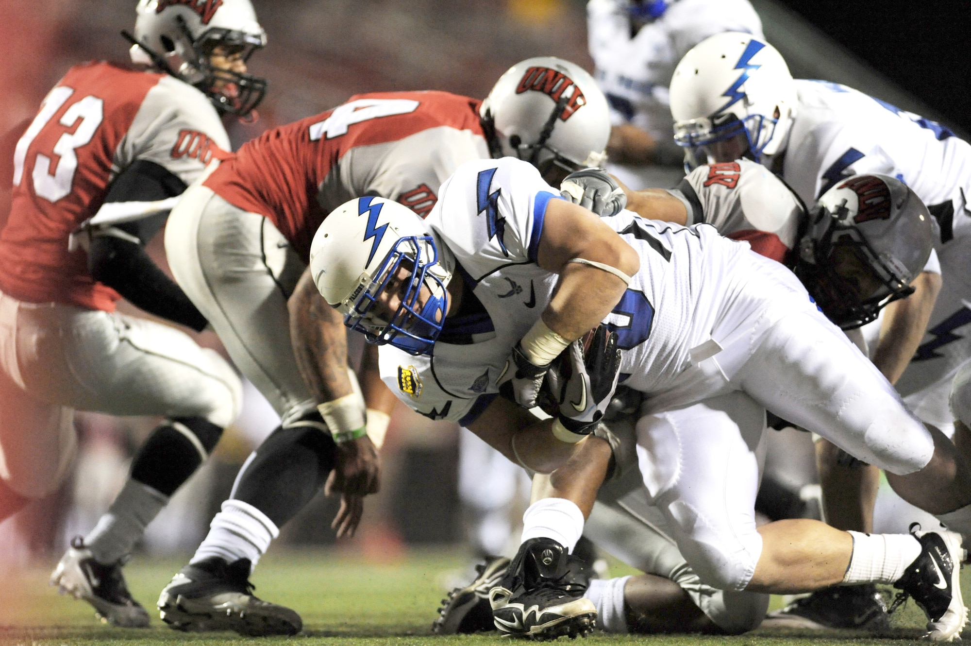 Air Force running back Ryan Southworth dives for yardage during the Falcons' game against the University of Nevada, Las Vegas Nov. 18, 2010, in Las Vegas. Southworth had five rushes for 18 yards in the Falcons' 35-20 victory over the Rebels. (U.S. Air Force photo/Airman 1st Class Daniel Hughes)
