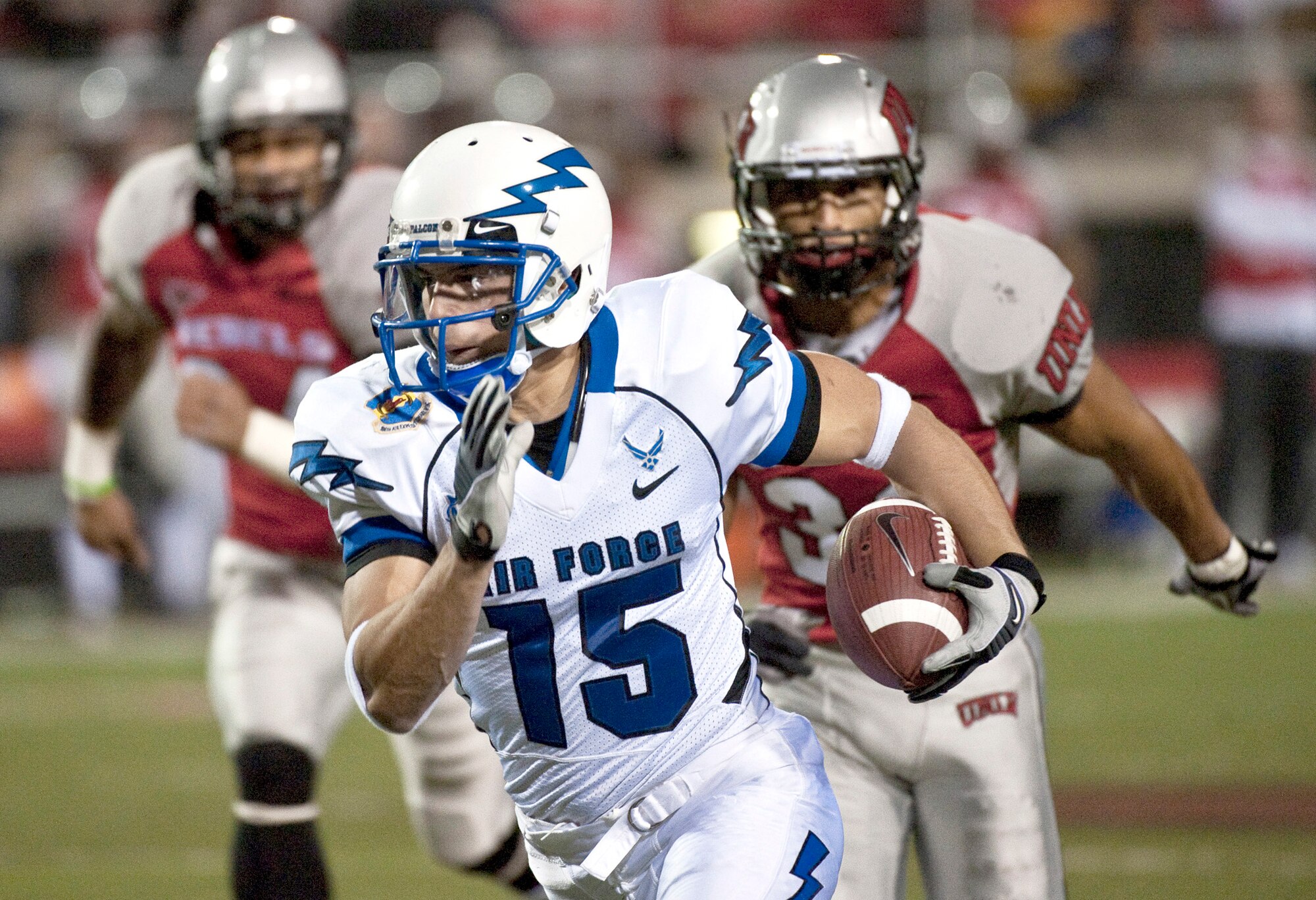Air Force wide receiver Jonathan Warzeka runs downfield during the Falcons' final game of the season against the University of Nevada, Las Vegas Nov. 18, 2010, in Las Vegas. Warzeka had two catches for 46 yards and a touchdown. The Falcons came back from a 17-7 deficit to defeat the Rebels, 35-20. (U.S. Air Force photo/Tech. Sgt. Michael R. Holzworth)