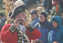 A fife player performs during America?s Hometown Thanksgiving Parade Nov. 20 in Plymouth, Mass. The parade began with a flyover from a Westover C-5.(US Air Force photo/Lt. Col. James Bishop)