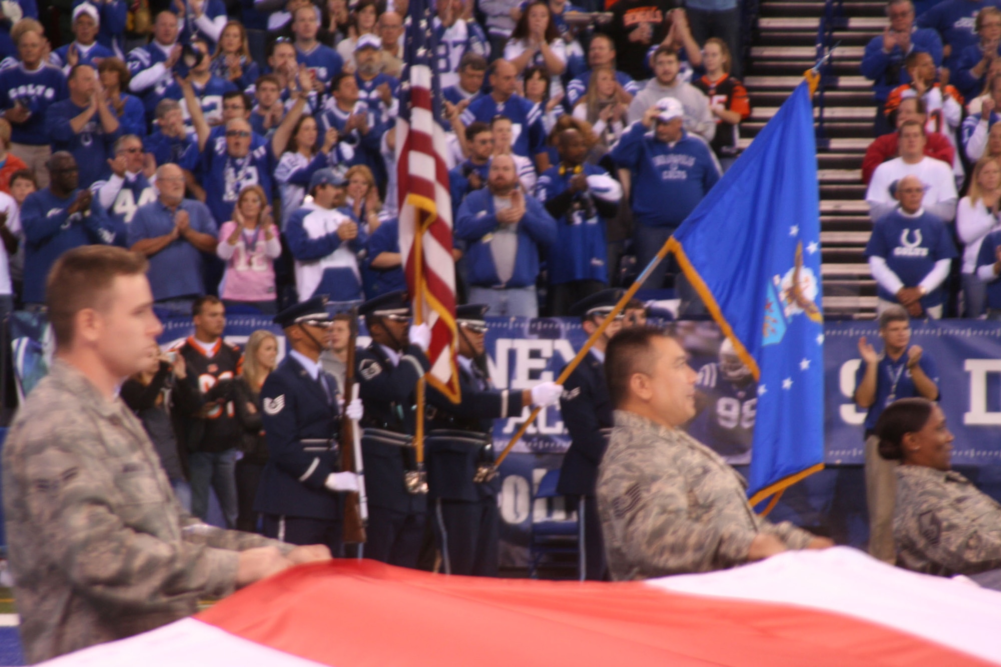 WRIGHT-PATTERSON AIR FORCE BASE, Ohio –Reservists from the 445th Airlift Wing participated during the pre-game activities for the Cincinnati Bengals vs Indianapolis Colts football game Nov. 14 by holding a large flag on the field during the National Anthem. The Wright-Patterson Air Force Base Honor Guard also performed during the pre-game activities (U.S. Air Force photo/Capt. Rod McNany)
