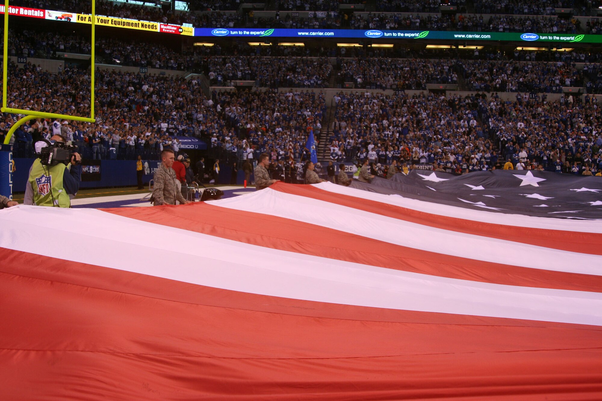 WRIGHT-PATTERSON AIR FORCE BASE, Ohio –Reservists from the 445th Airlift Wing participated during the pre-game activities for the Cincinnati Bengals vs Indianapolis Colts football game Nov. 14 by holding a large flag on the field during the National Anthem. The Wright-Patterson Air Force Base Honor Guard also performed during the pre-game activities (U.S. Air Force photo/Capt. Rod McNany)
