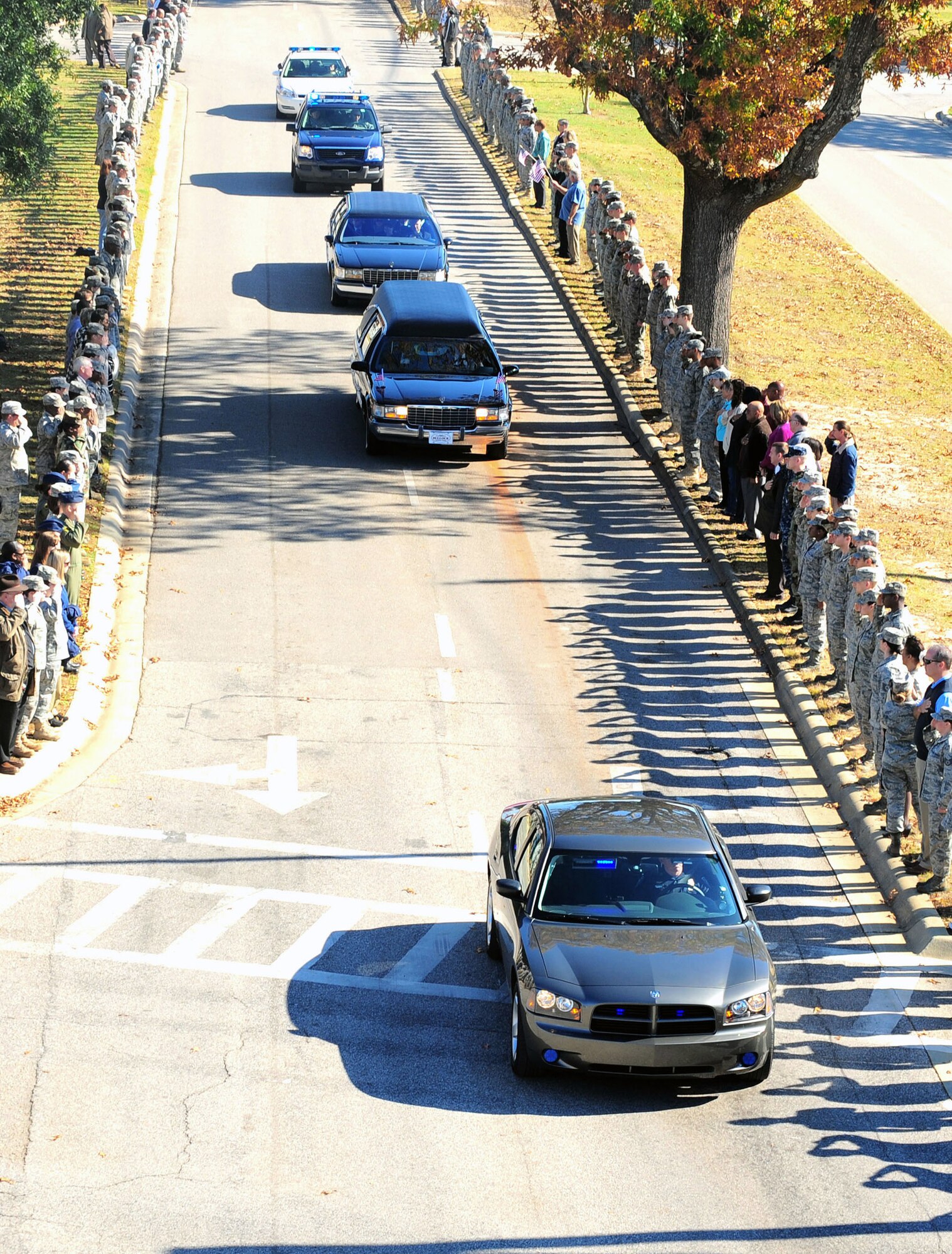 Thousands of servicemembers lined the streets to pay their last respects to a fallen Airman Nov. 18, 2010, at Shaw Air Force Base, S.C. . Staff Sgt. Andrew Bubacz, a native of Dalzell, S.C., died Nov. 12, 2010, while deployed to Nuristan, Afghanistan on a provincial reconstruction team. Sergeant Bubacz was a 97th Communications Squadron at Altus Air Force Base, Okla.  (U.S. Air Force photo/Senior Airman David Minor) 