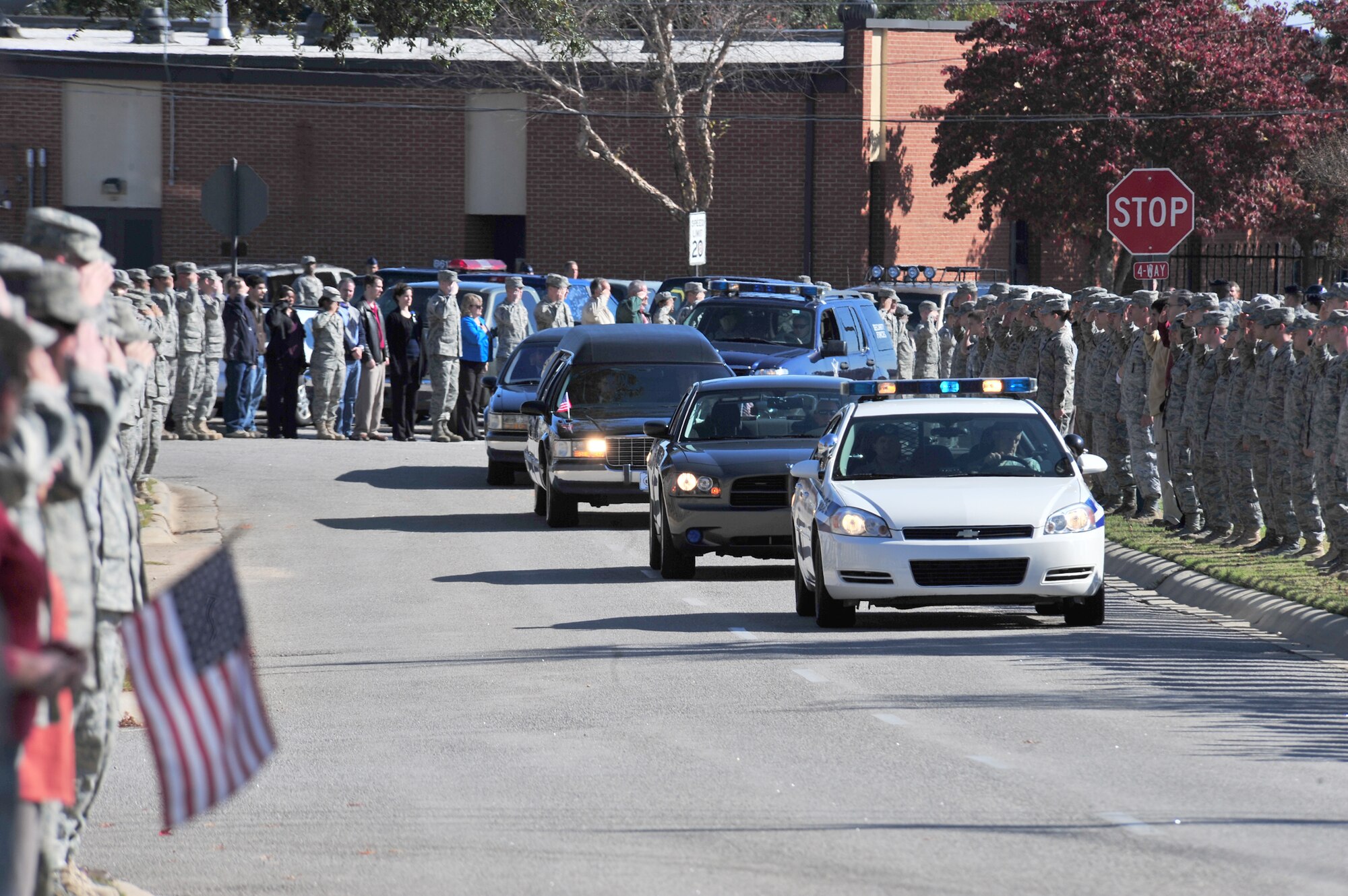 Thousands of servicemembers lined the streets  to pay their last respects to a fallen Airman Nov. 18, 2010, at Shaw Air Force Base, S.C. . Staff Sgt. Andrew Bubacz, a native of Dalzell, S.C., died Nov. 12, 2010, while deployed to Nuristan, Afghanistan on a provincial reconstruction team. Sergeant Bubacz was a 97th Communications Squadron at Altus Air Force Base, Okla. (U.S. Air Force photo/Airman 1st Class Amber E. Jacobs) 