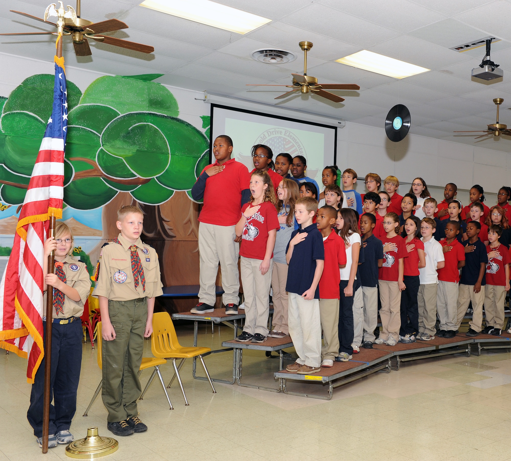 Children from Arnold Drive Elementary School say the Pledge of Allegiance during the Blue Ribbon Ceremony Nov. 22, 2010, at Little Rock Air Force Base, Ark. Arnold Drive Elementary School was one of four Arkansas schools designated as a Blue Ribbon School. (U.S. Air Force photo by Airman 1st Class Ellora Stewart)
