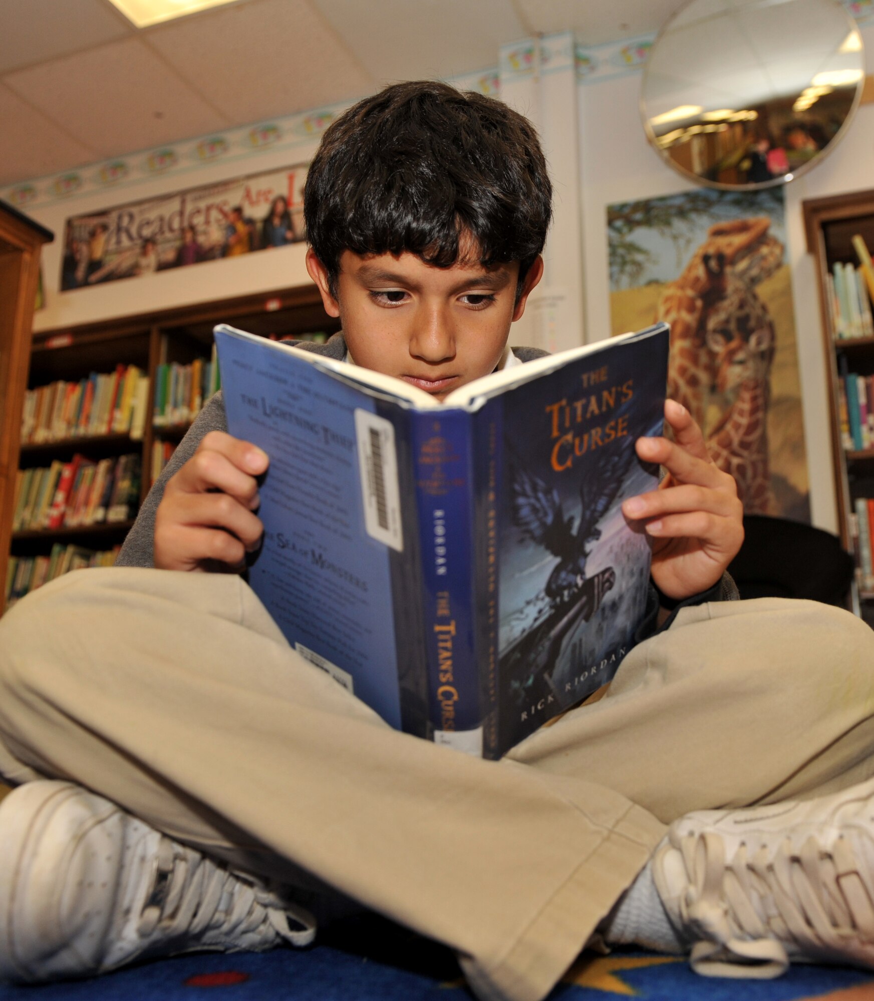 Nicolas Mancillas Jr., 10, son of Marine Staff Sgt. Nicolas Mancillas Sr., reads a book Nov. 16, 2010, at Arnold Drive Elementary School at Little Rock Air Force Base, Ark.  Hard work by students, teachers and parents led to the excellence that led to the school being one of four Arkansas schools designated as “Blue Ribbon Schools” by the U.S. Department of Education. (U.S. Air Force photo by Senior Airman Gul Crockett)