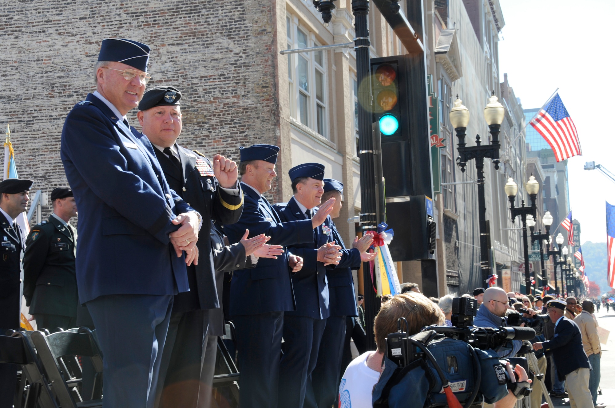 Air Force Gen. Craig R. McKinley, left, chief of the National Guard Bureau, and Army Maj. Gen. Terry M. Haston, second left,  the adjutant general of the Tennessee National Guard, review marchers in the Veterans Day parade in Knoxville, Tenn., Nov. 11, 2010. (U.S. Air Force photo by Master Sgt. Kurt Skoglund) (Released)