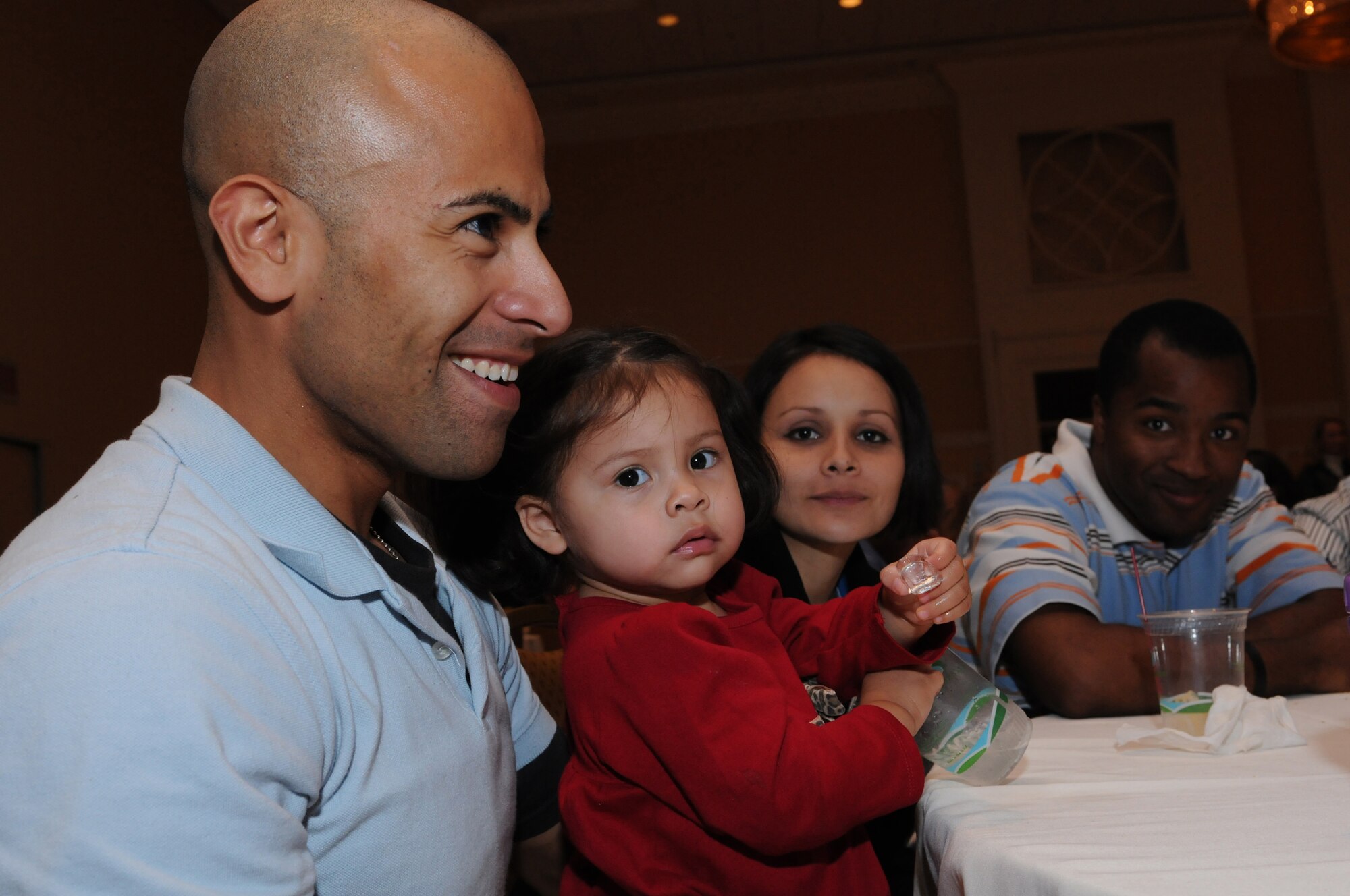 NATIONAL HARBOR, Md. -- The 459th Air Refueling Wing held a Yellow Ribbon event for its Airmen who recently returned from overseas deployments at the Gaylord National Hotel and Convention Center Nov. 19-21. The weekend provided Airmen and their family members with information about reintegrating back into civilian and family life. The three-day program included information on military benefits, employer support, financial management and healthy living. The weekend also featured performances by the Air Force Honor Guard drill time and the Air Force rock band, Max Impact. (U.S. Air Force Photo/Tech. Sgt. Steve Lewis) 