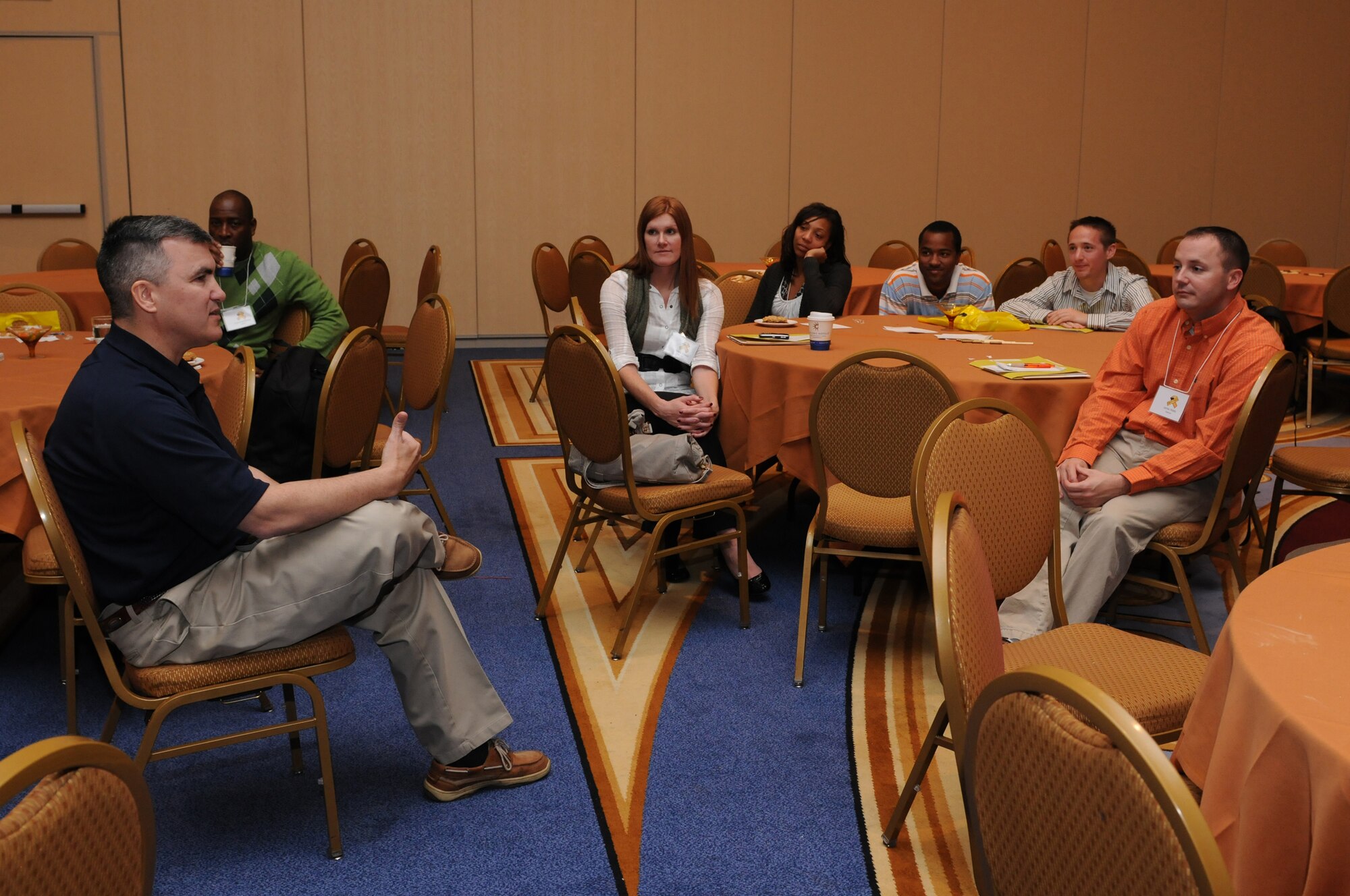 NATIONAL HARBOR, Md. -- Maj. Theodore Nicholson, 439th Airlift Wing chaplain, speaks to a group of 459th Air Refueling Wing Airmen during the Yellow Ribbon event Nov. 20. The three-day event was offered to 459 ARW servicemembers who recently returned from deployments and included information on military benefits, employer support, financial management and healthy living. The weekend also featured performances by the Air Force Honor Guard and the Air Force band, Max Impact. (U.S. Air Force Photo/Tech. Sgt. Steve Lewis) 