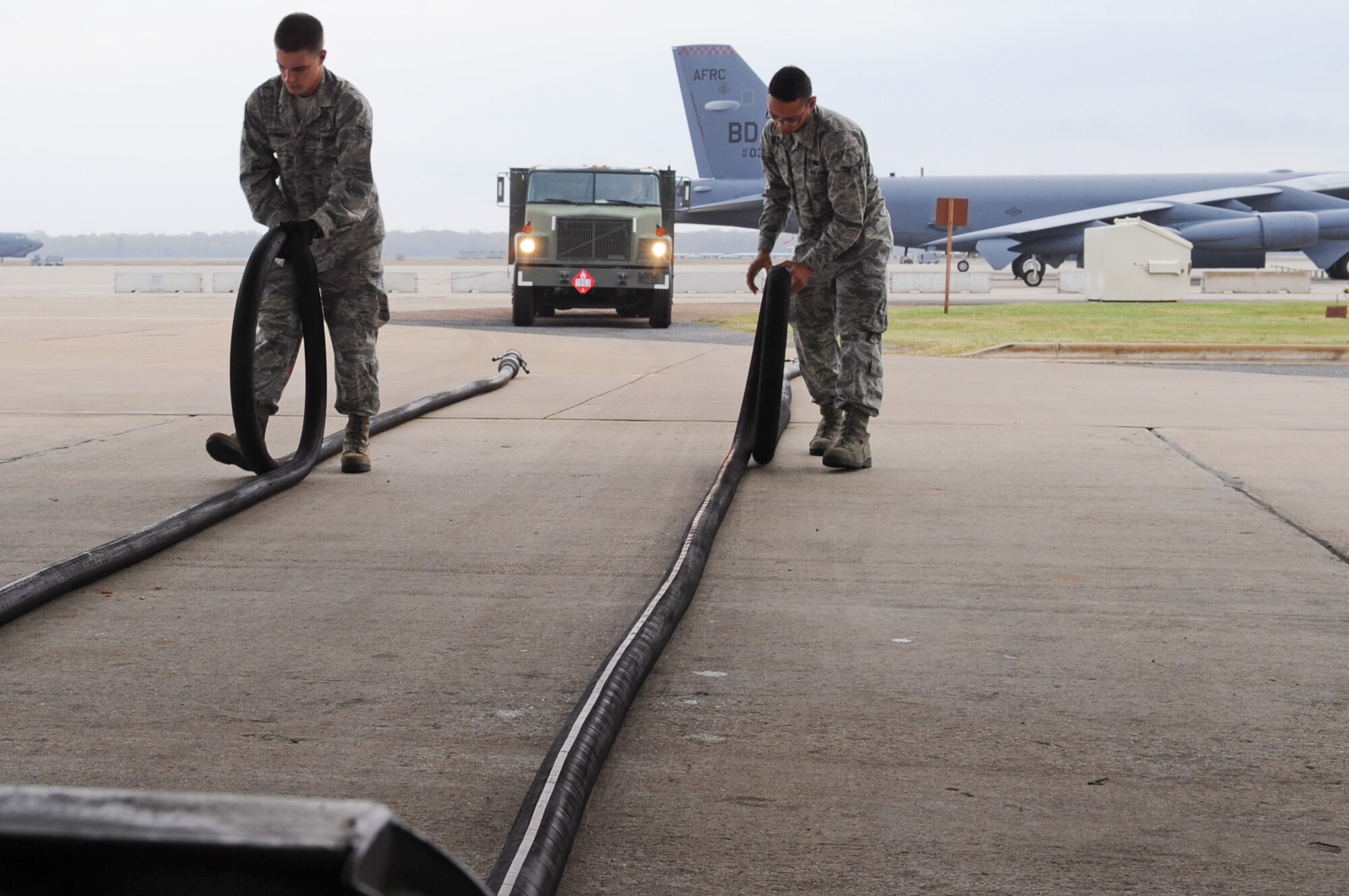 Fuel operators from the 2nd Logistics Readiness Squadron conduct a 140-point inspection on a R-14 fueling truck at Barksdale Air Force Base, La., Nov. 22. The 2 LRS team consists of more than 491 personnel across seven flights consisting of material management, fuels management, readiness, management and systems, traffic management, vehicle management and vehicle operations. (U.S. Air Force photo/Senior Airman Brittany Y. Bateman)(RELEASED)