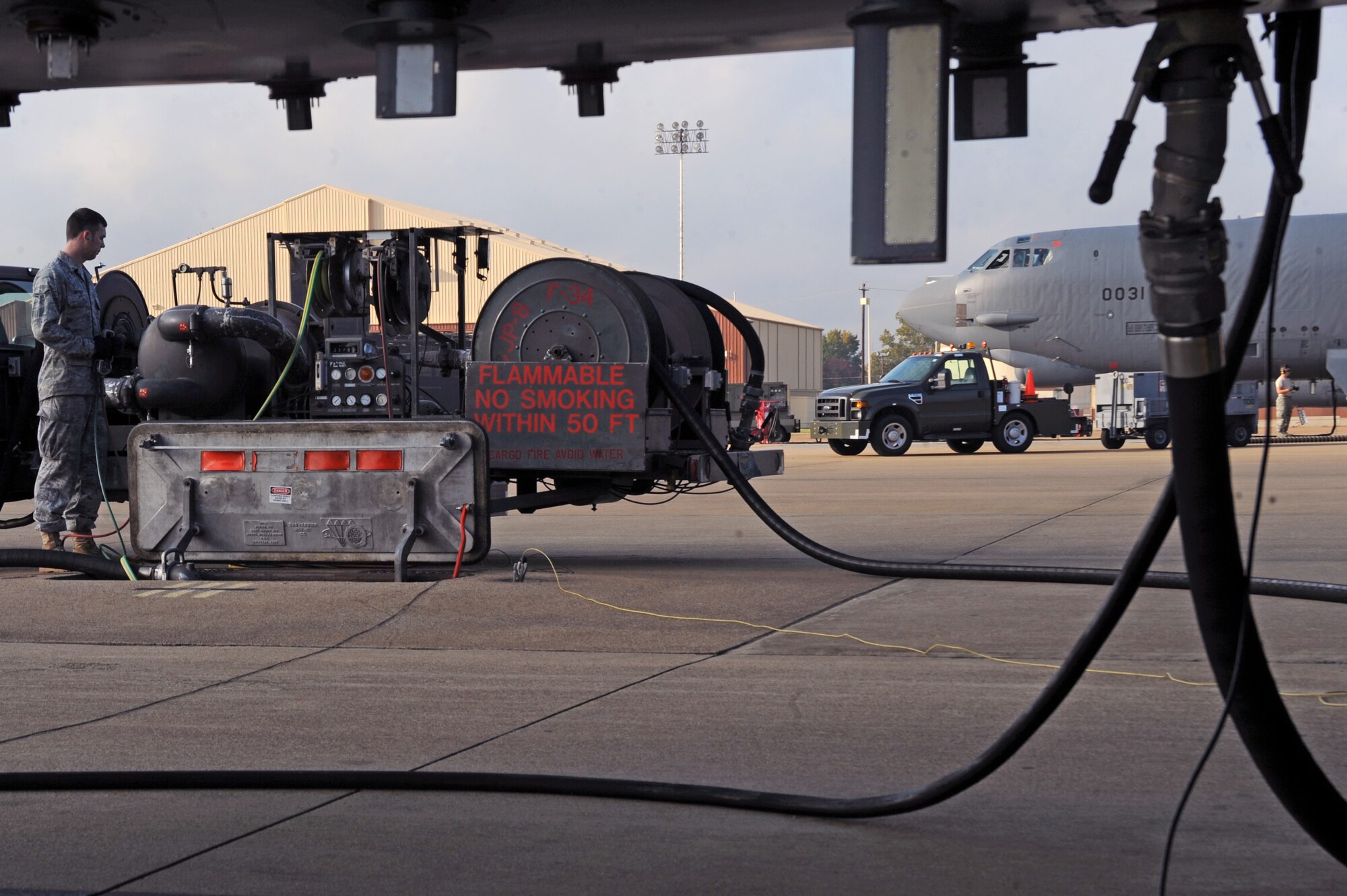 Airman 1st Class Johnny Bippert, 2nd Logistics Readiness Squadron, refuels a B-52H Stratofortress at Barksdale Air Force Base, La., Nov. 22. The 2 LRS team consists of more than 491 personnel across seven flights consisting of material management, fuels management, readiness, management and systems, traffic management, vehicle management and vehicle operations. (U.S. Air Force photo/Senior Airman Brittany Y. Bateman)(RELEASED)
