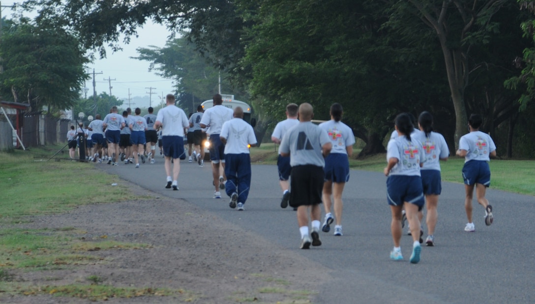 SOTO CANO AIR BASE, Honduras --  Taking advantage of the cool early morning temperatures, Team Bravo participates in the Turkey Trot here Nov. 22. The event began at 6 a.m. and the first runners crossed the finish line approximately 20 minutes later. The run was sponsored by the base Morale, Welfare and Recreation office. (U.S. Air Force photo/Tech. Sgt. Benjamin Rojek)