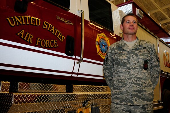 Master Sgt. Mark Watczak, Assistant Fire Chief of the 148th Fighter Wing, Duluth, Minn., stands in front of a medium rescue truck while being interviewed on Nov. 20, 2010. Watczak, a 20 year veteran of the 148th FW, was recently recognized as Military Fire Fighter of the Year and presented with "The Chief Albert Fitzpatrick Award." (U.S. Air Force photo by Senior Airman Sarah C. Hayes)