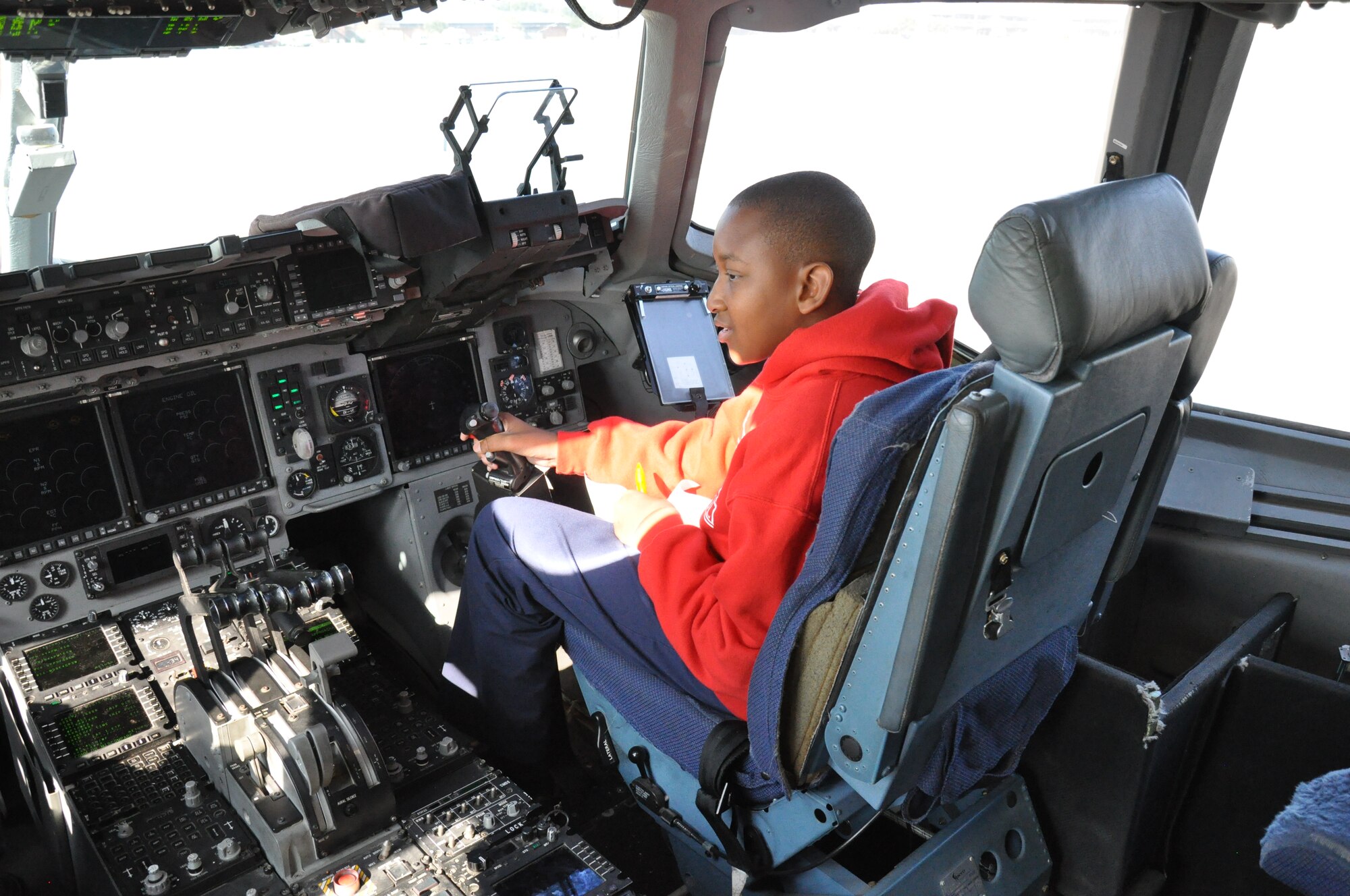 A student from The Charleston Catholic School experiences the flight deck of a C-17 Globemaster III aircraft during their tour of Joint Base Charleston, S.C. Nov. 19, 2010. (U.S. Air Force photo/Airman 1st Class Robert Pilch)