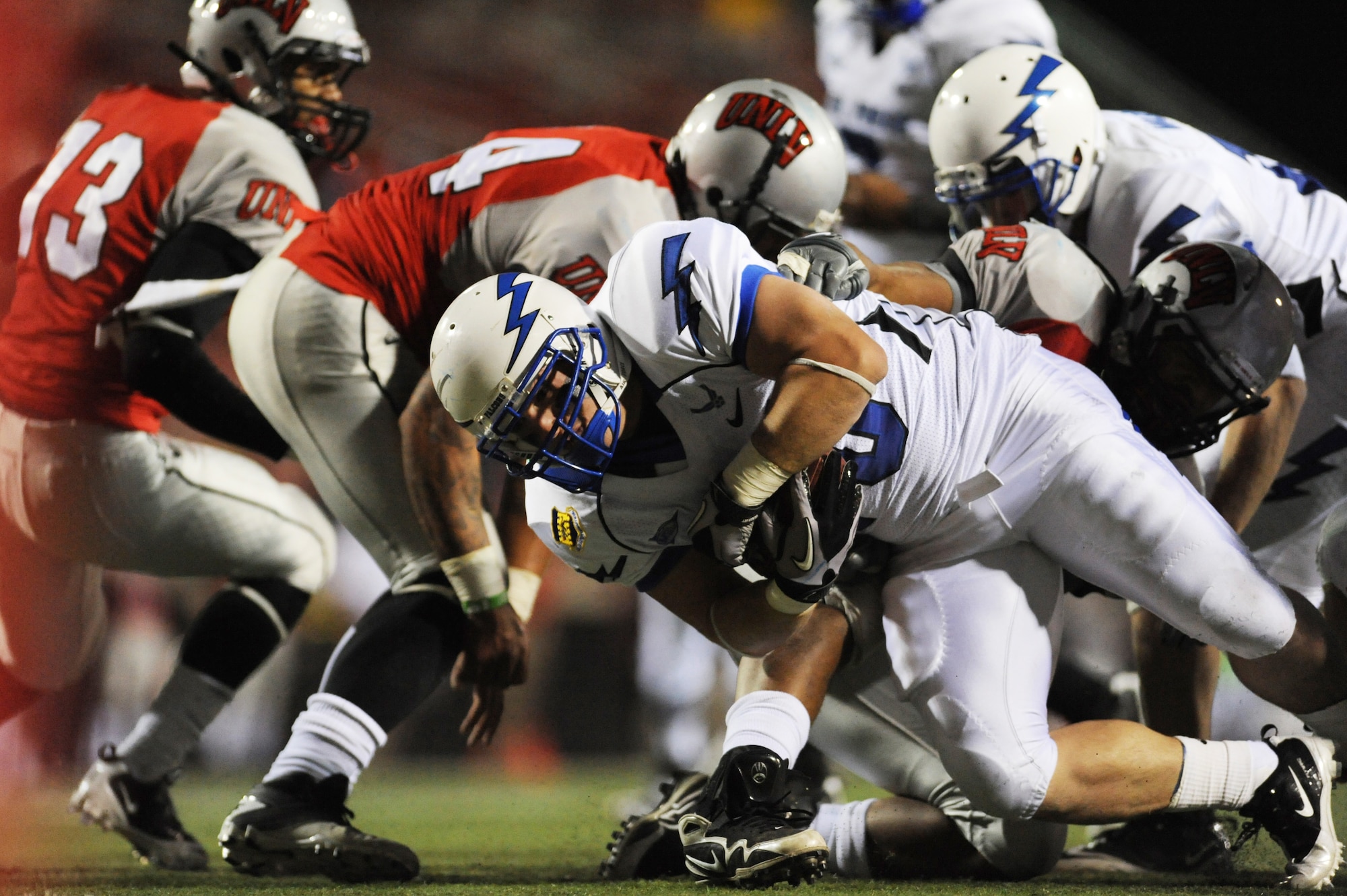 Air Force running back Ryan Southworth dives for yardage during the Falcons' game against UNLV in Las Vegas Nov. 18, 2010. Southworth, a native of Paris, Texas, had five rushes for 18 yards in the Falcons' 35-20 victory over the Rebels. (U.S. Air Force photo/Airman 1st Class Daniel Hughes)